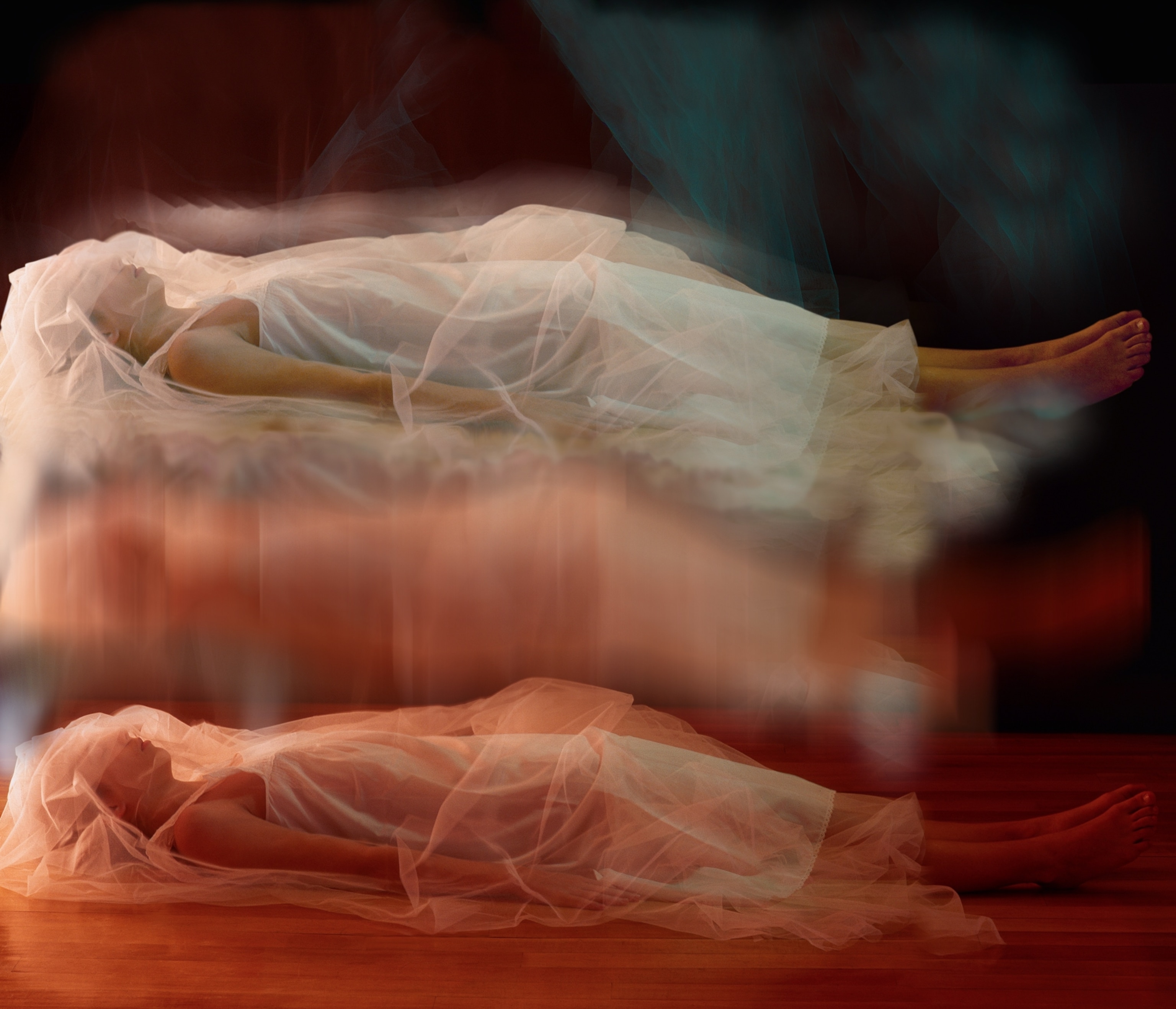 A multi-exposure image of a woman sleeping, giving the appearance of her sleeping self rising from her physical self.