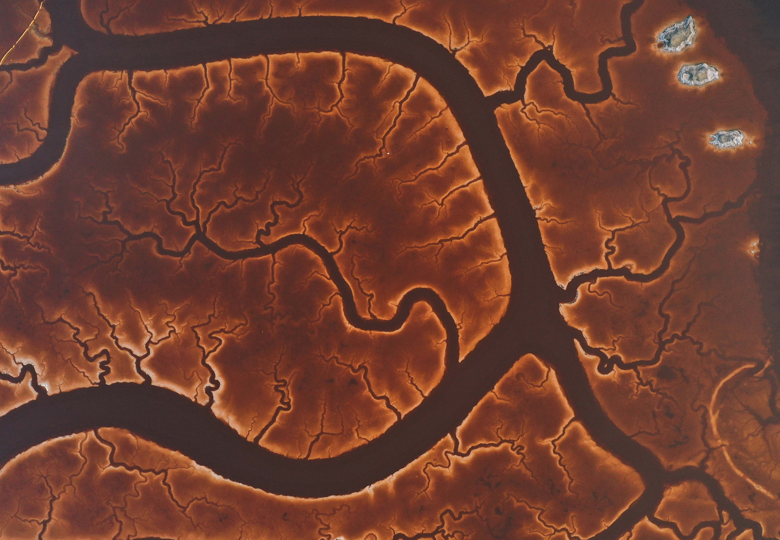 An aerial view shows the salt marsh ponds at Alviso Marina County Park in San Jose, California.