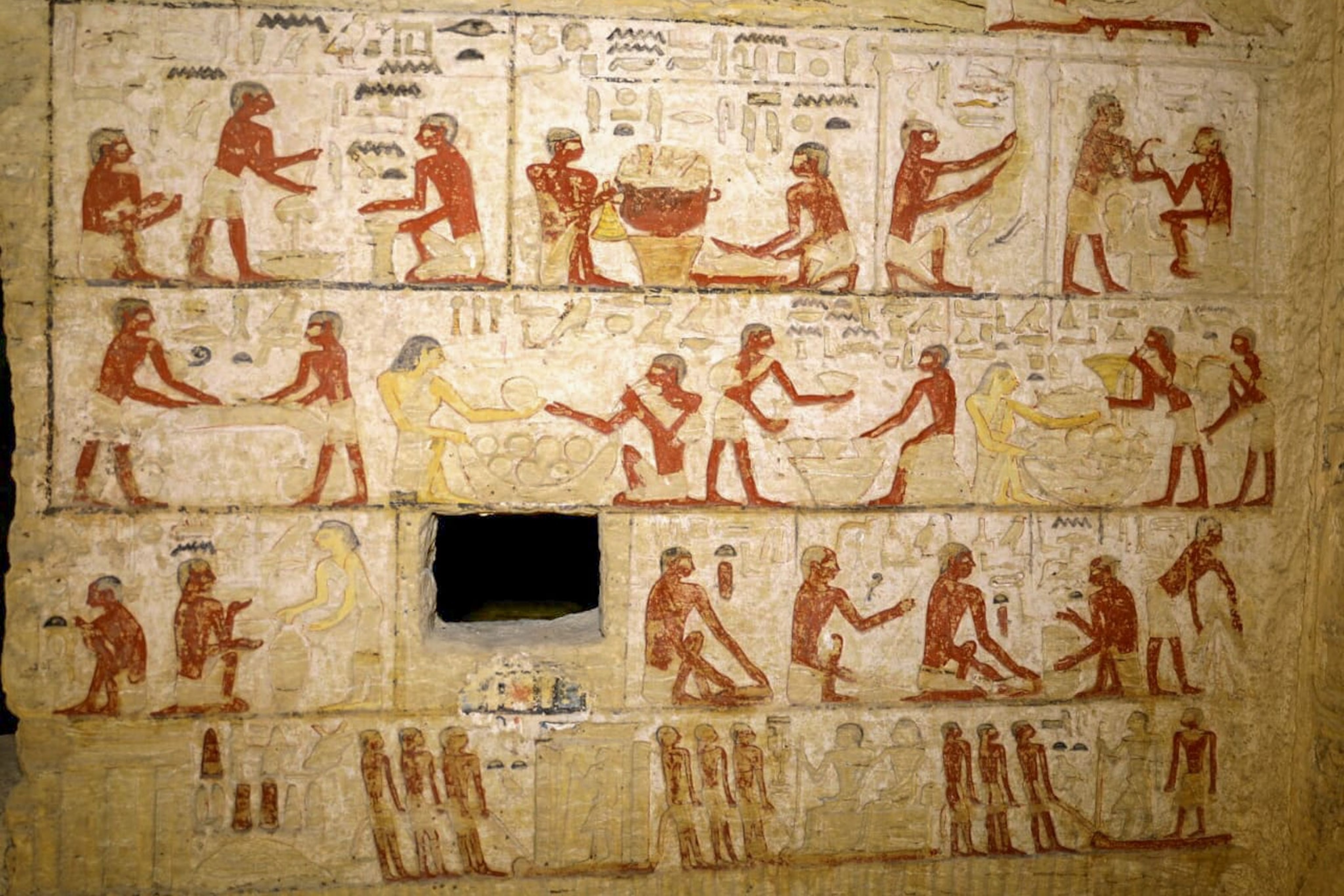 drawings on a wall in a tomb in Egypt