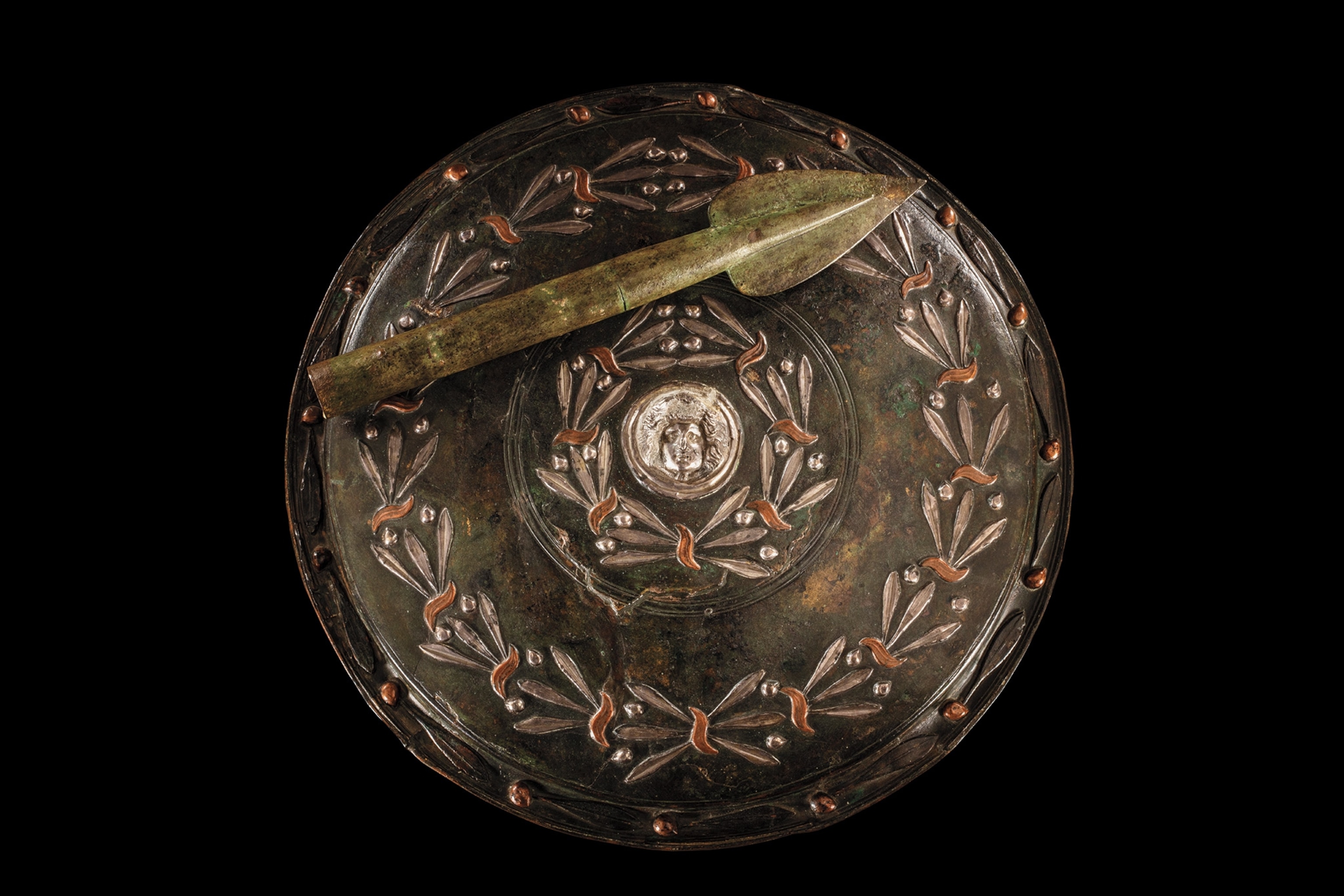 Eques gladiators, who began their fights on horseback, carried a bronze shield and spear into battle.