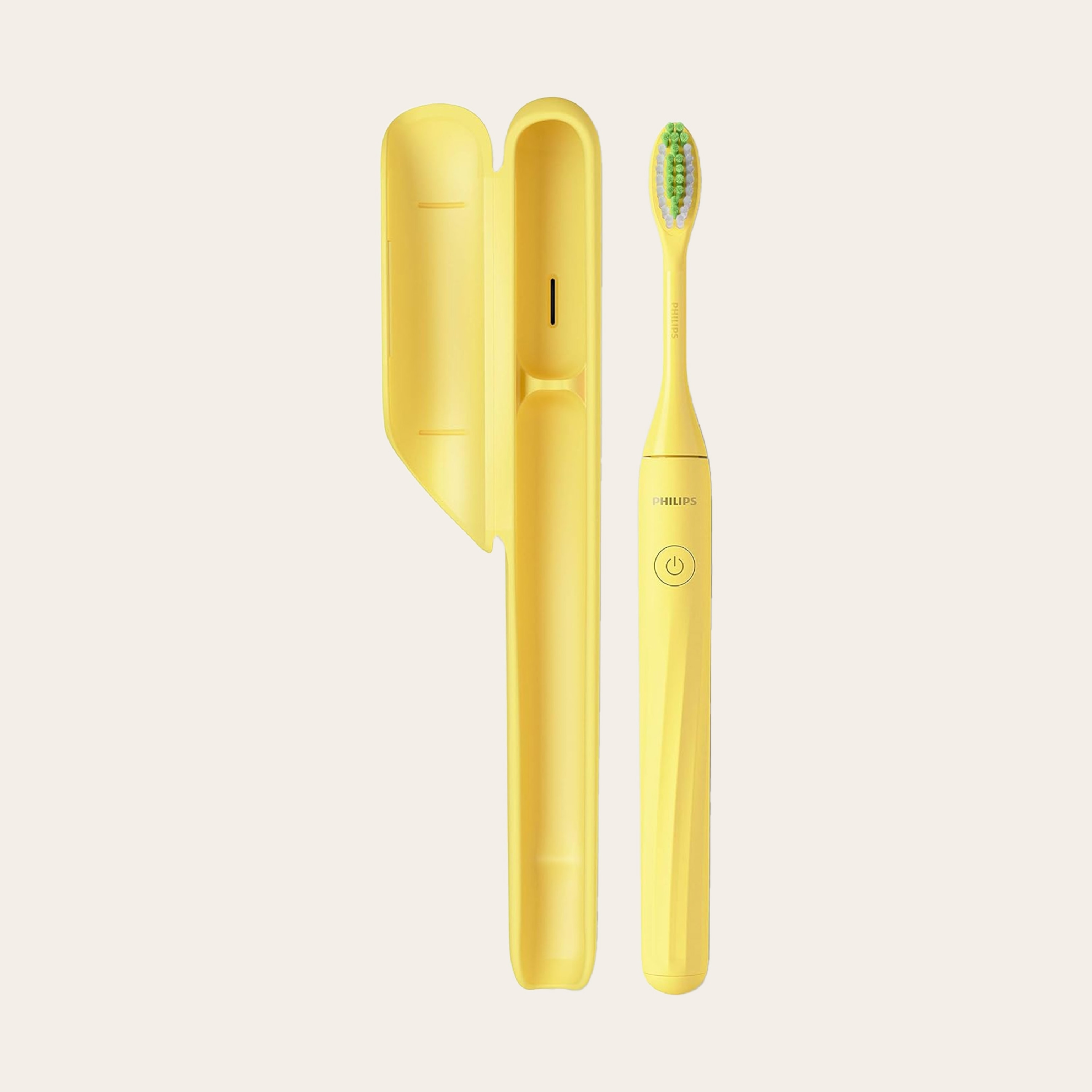 A yellow Philips One by Sonicare battery toothbrush.