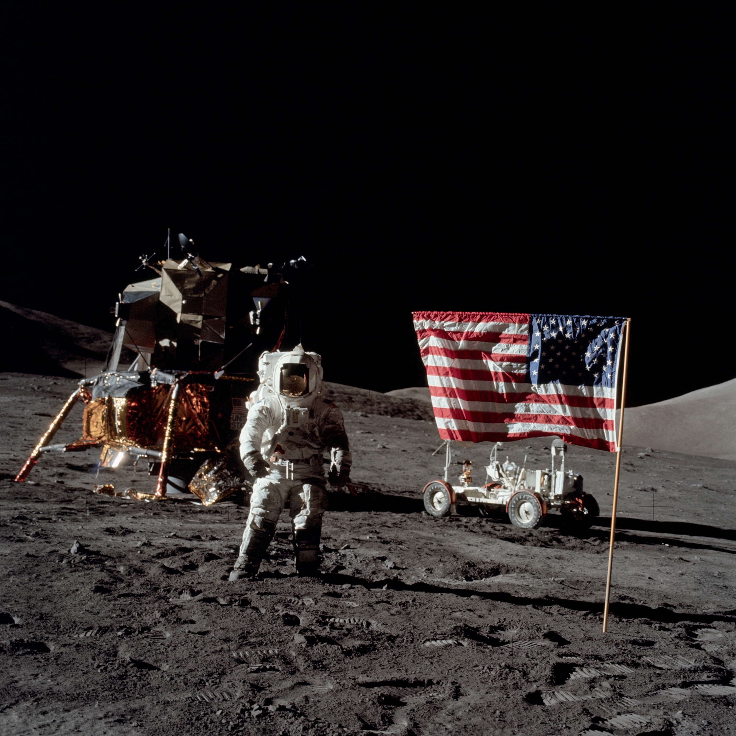 Apollo 17 astronaut stands on the moon.