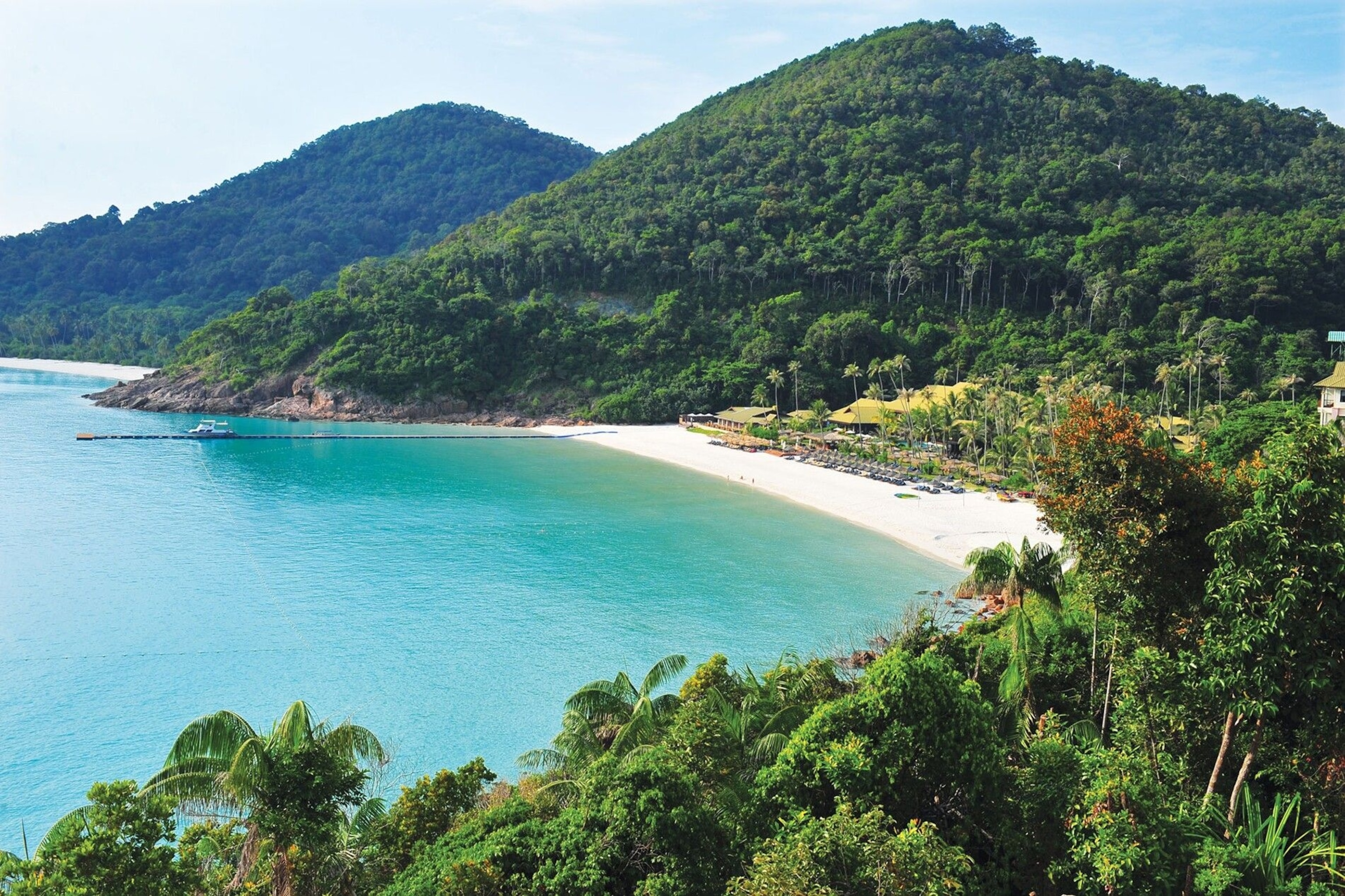 Blue-green sea and sand white beaches on Malaysia's peninsular islands.