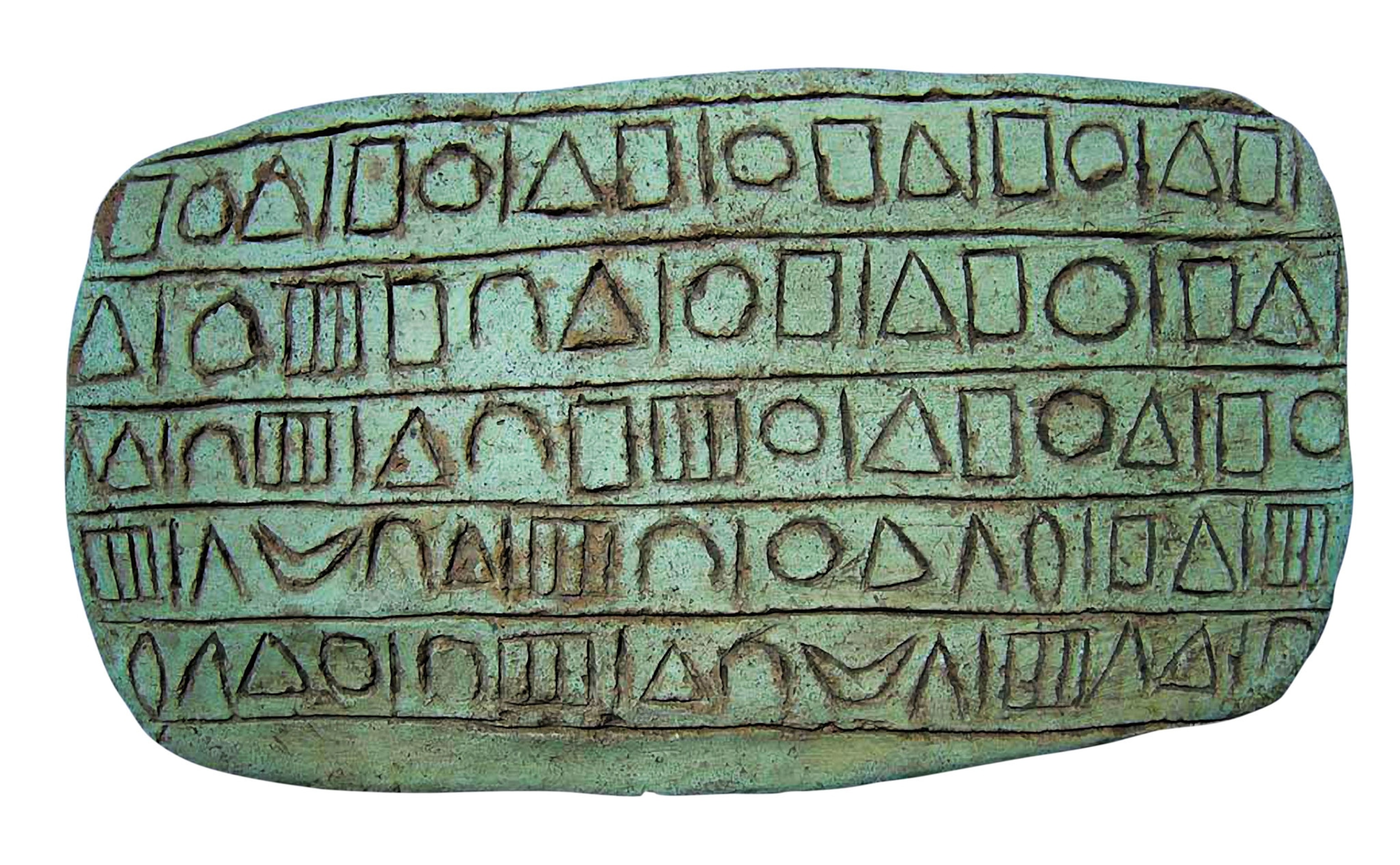 A green stone writing on it