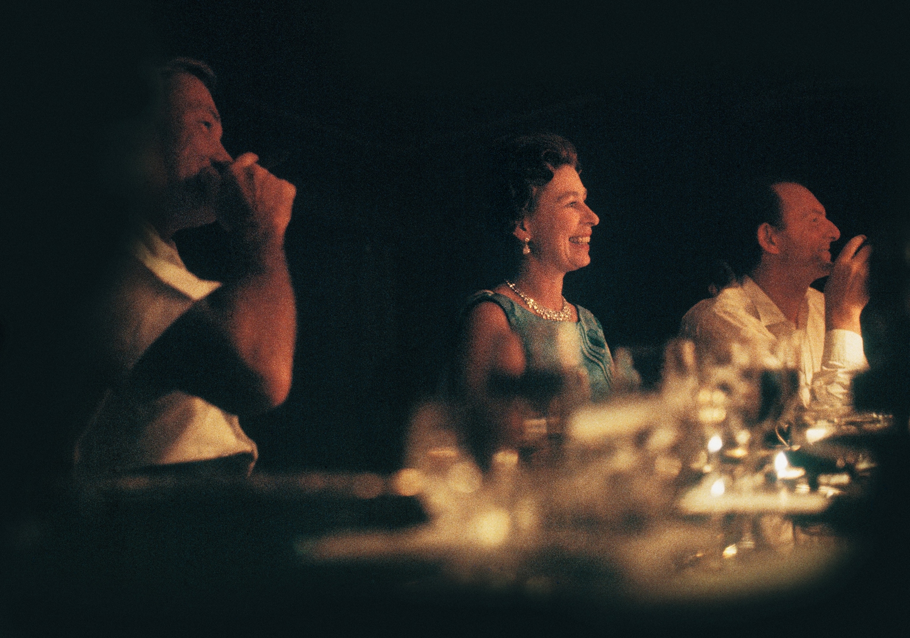 Elizabeth dines in luxury on her royal yacht in 1972.