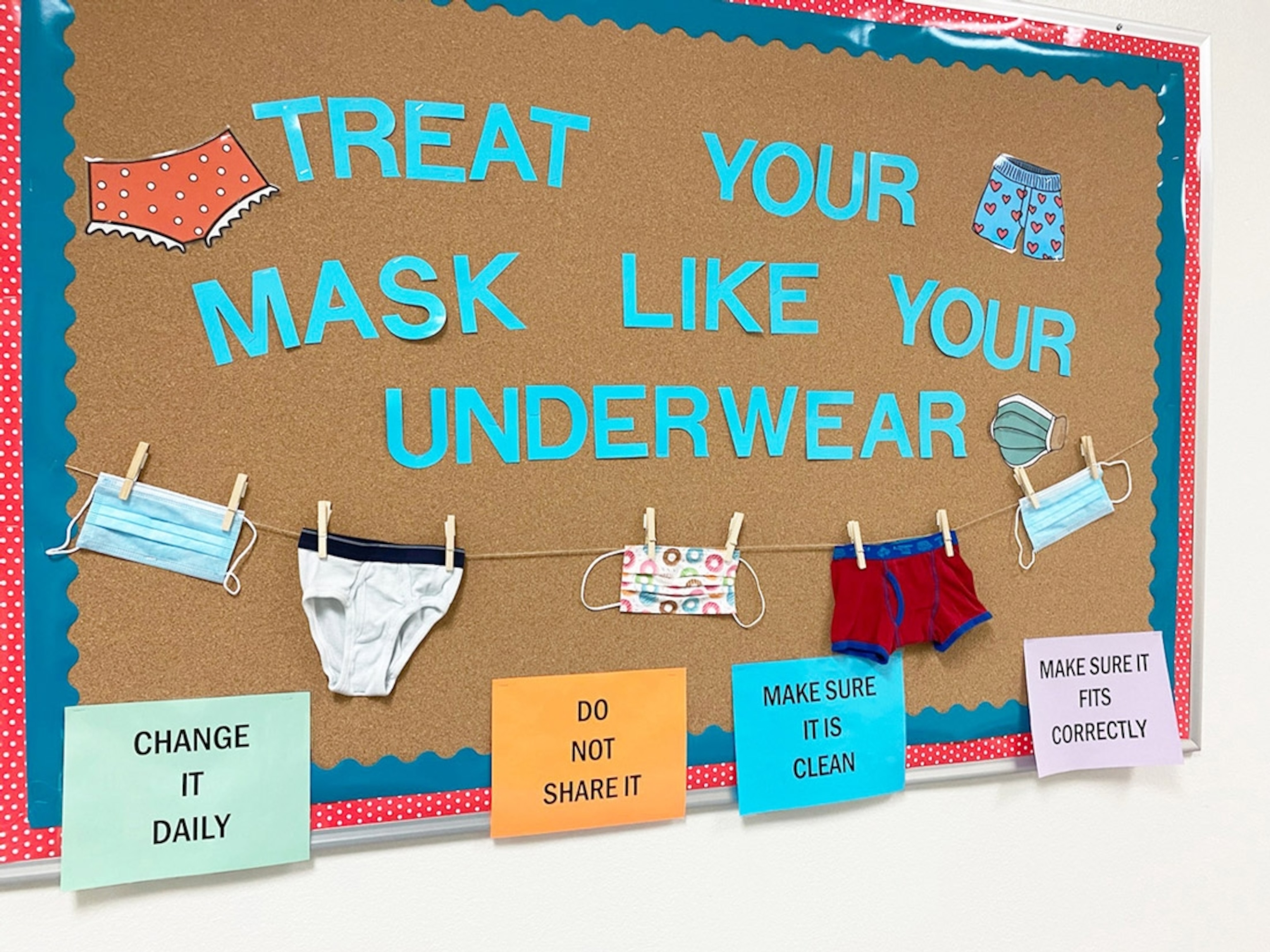 A bulletin board that reminds students to treat their masks like underwear. Artesia High School, Artesia, New Mexico