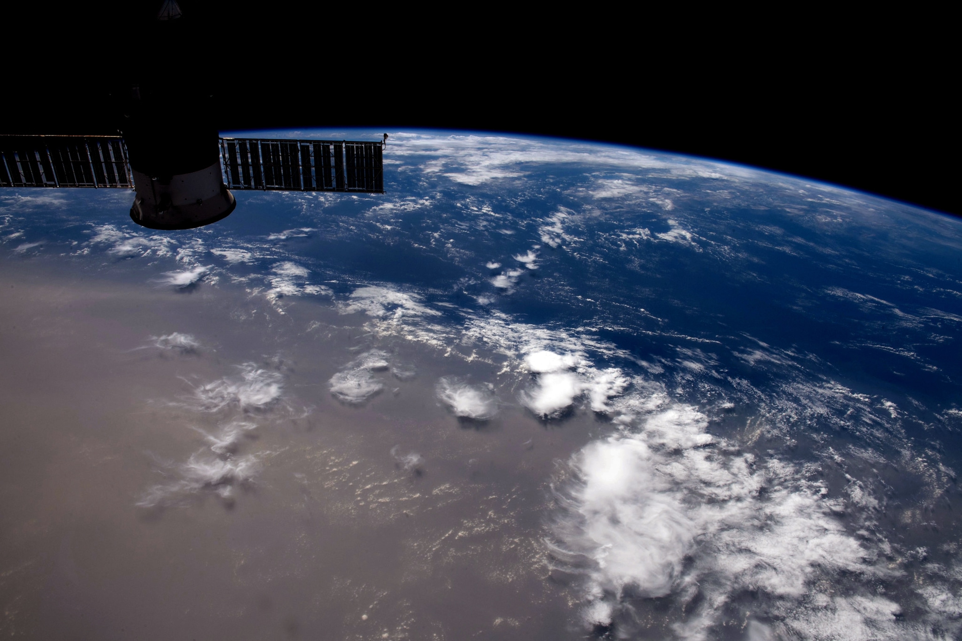 blue earth with large gray shade.