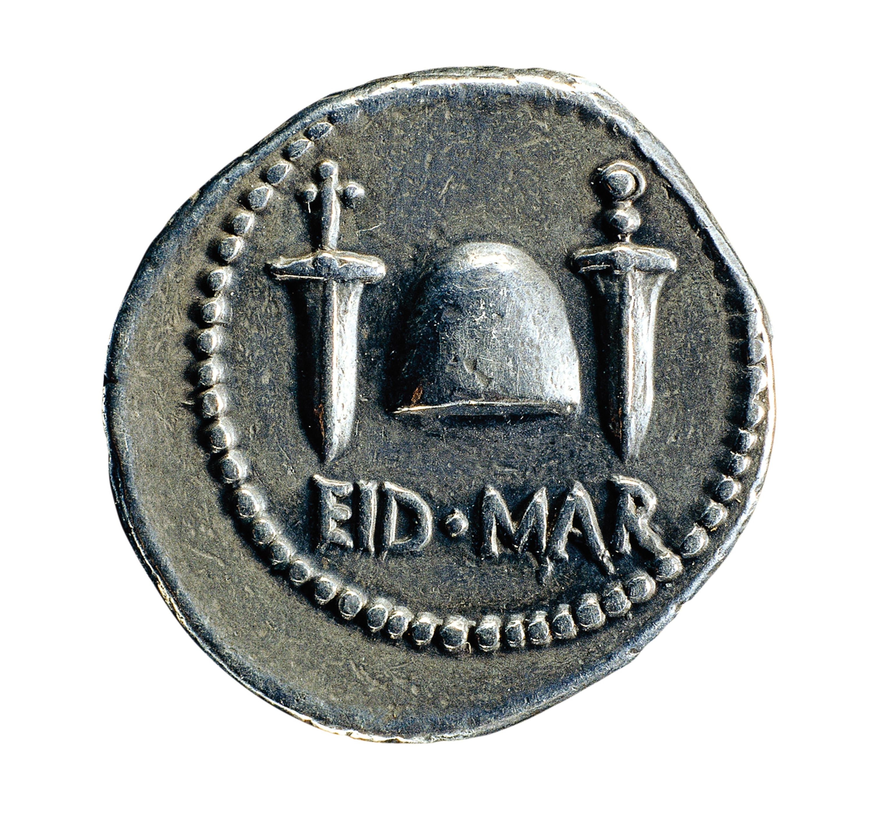 Minted by Brutus in 43-42 B.C., a coin bears the inscription “Eid Mar” (“Ides of March”) and commemorates Julius Caesar’s assassination.