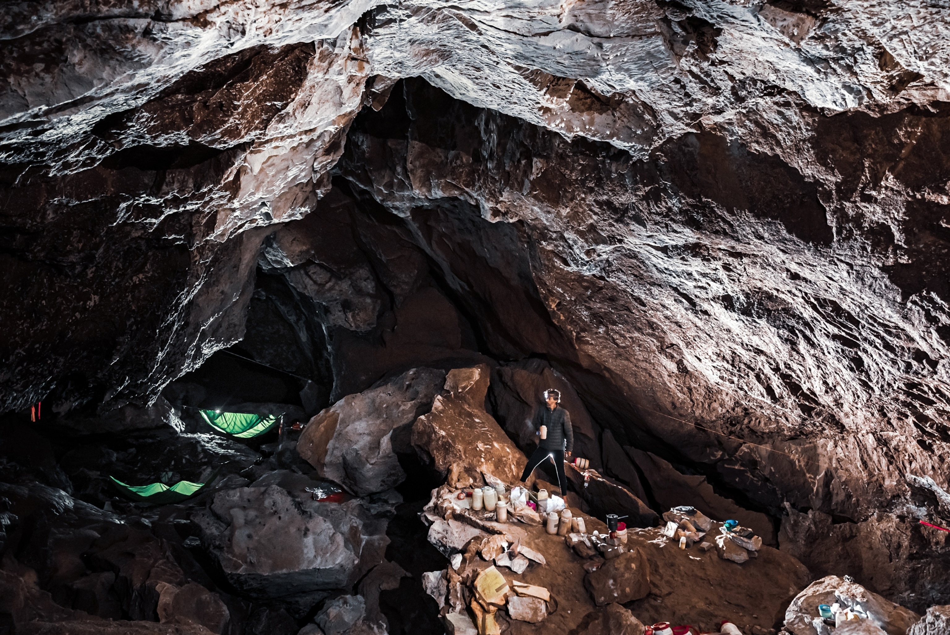 Picture of green tents of underground camp