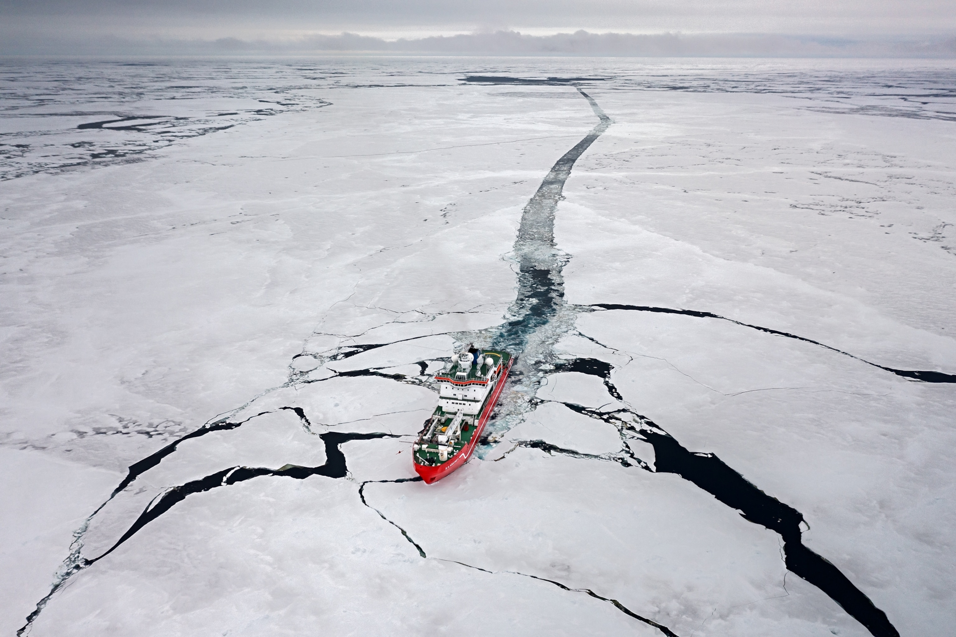 The S.A. Agulhas II, the expedition vessel for Endurance22, leaves a wake of open water as it breaks through the pack ice