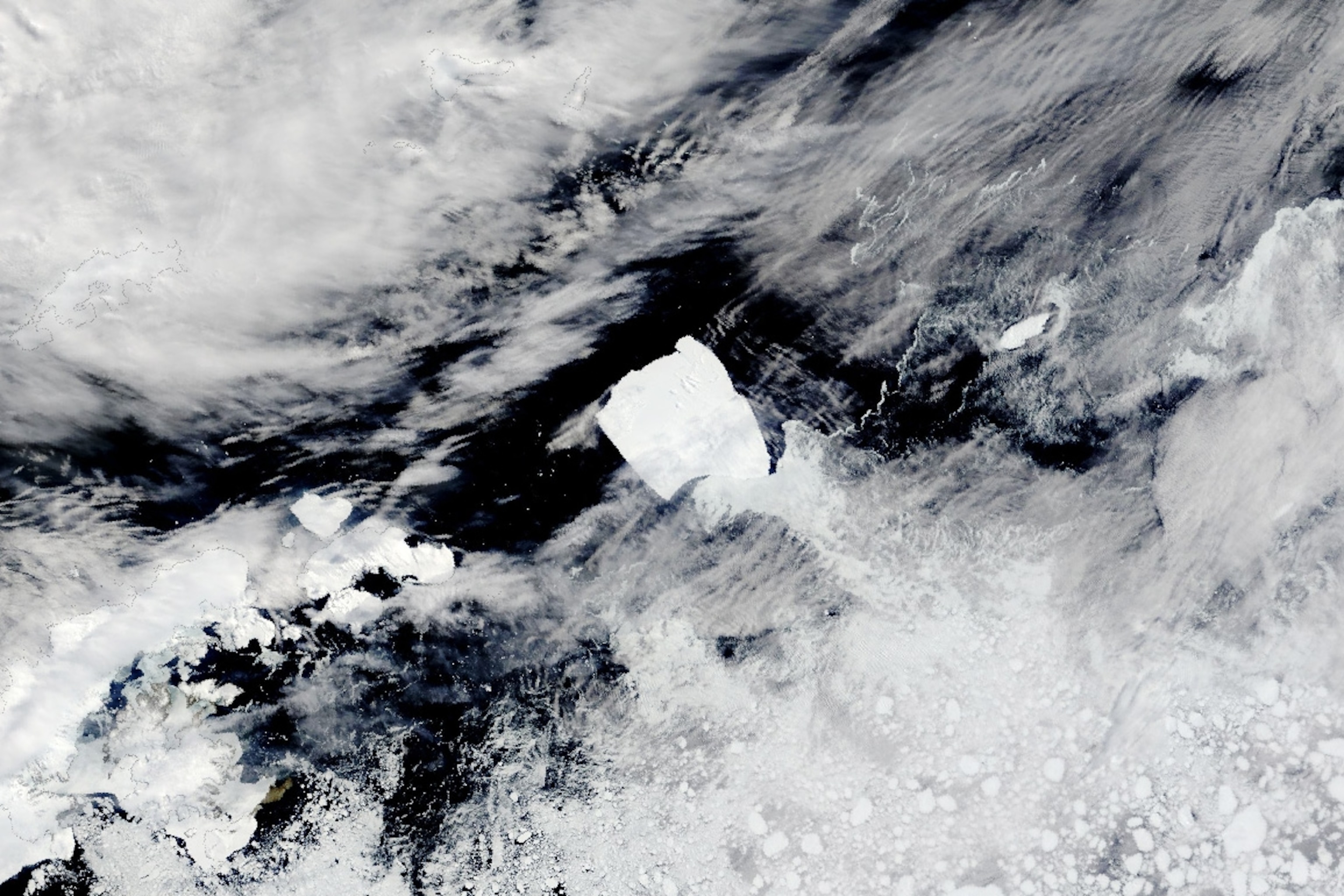 A aerial view of, an ice sheet moving.