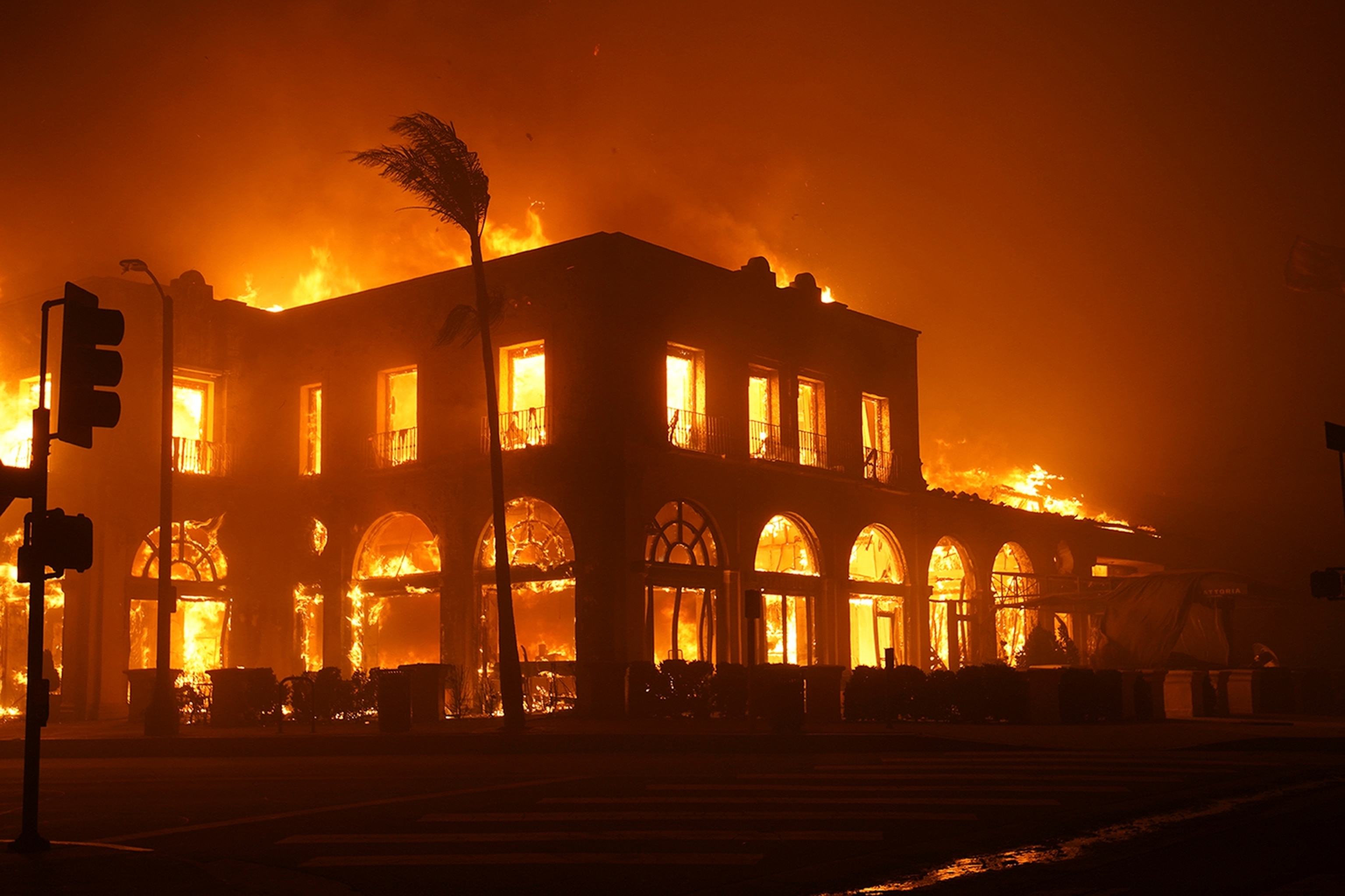 Large structure engulfed in flames.