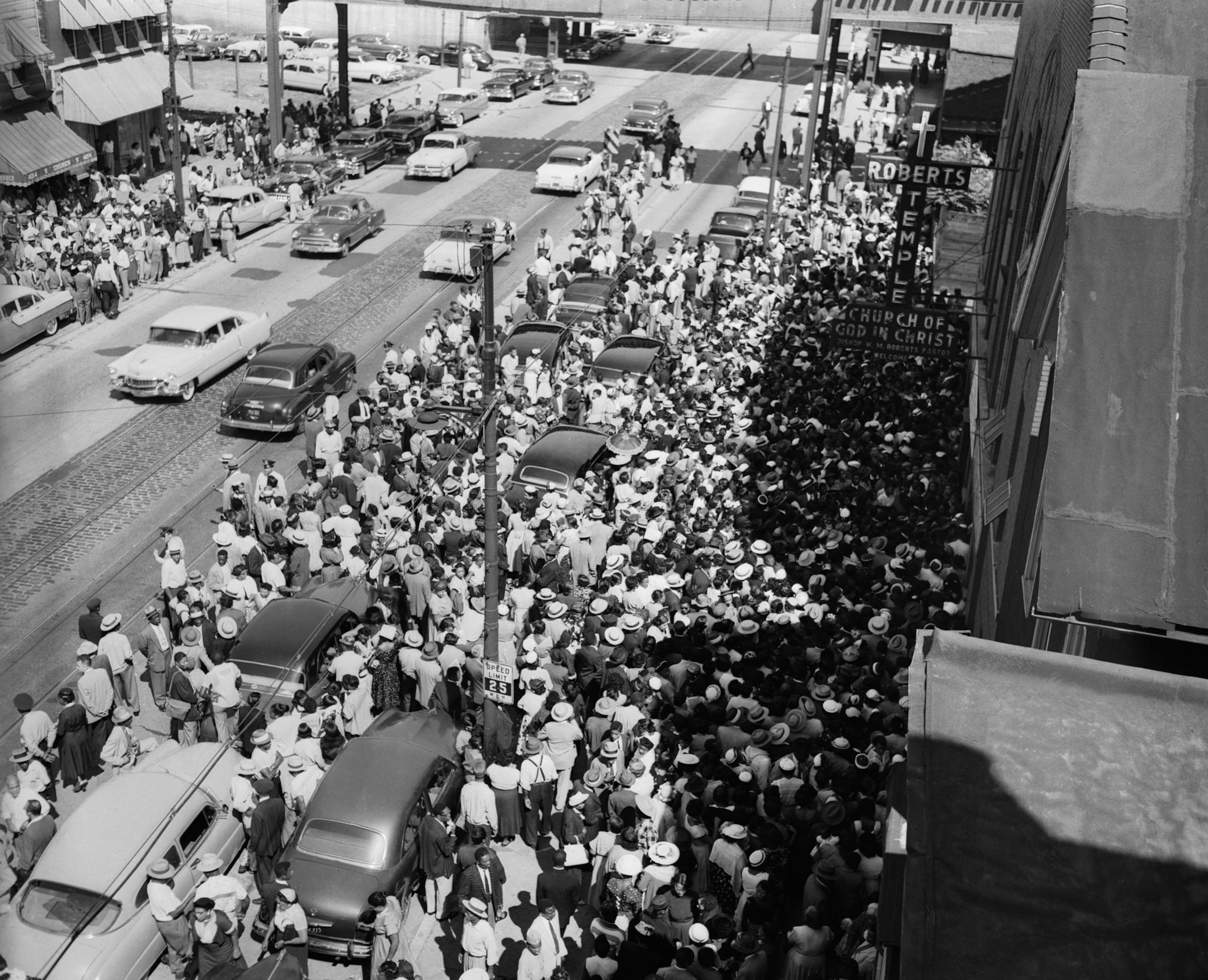 Mourners and curiosity seekers flock around entrance to Roberts Temple Church of God in Christ during the funeral services for Emmett Till.