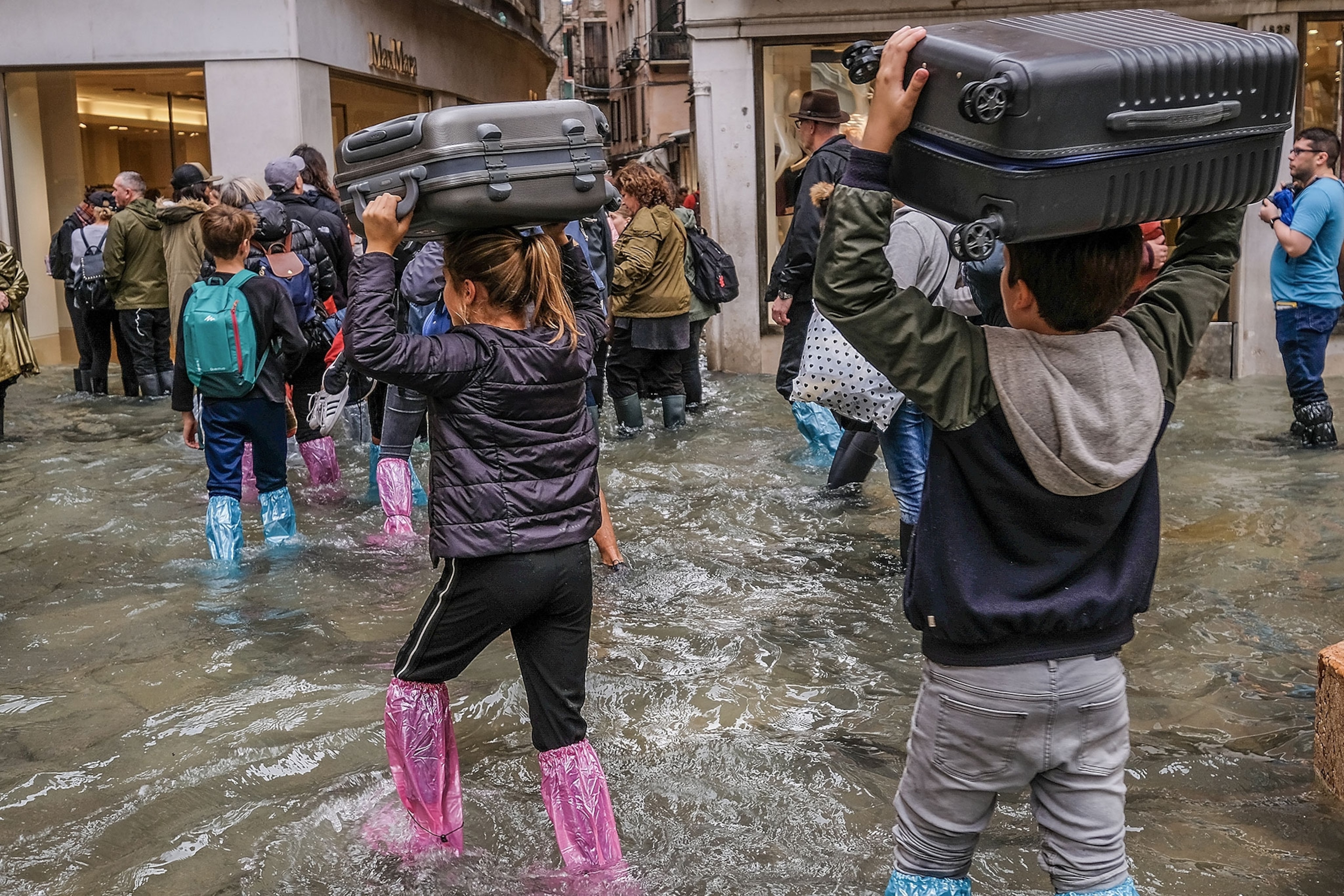 tourists in flooded Venice