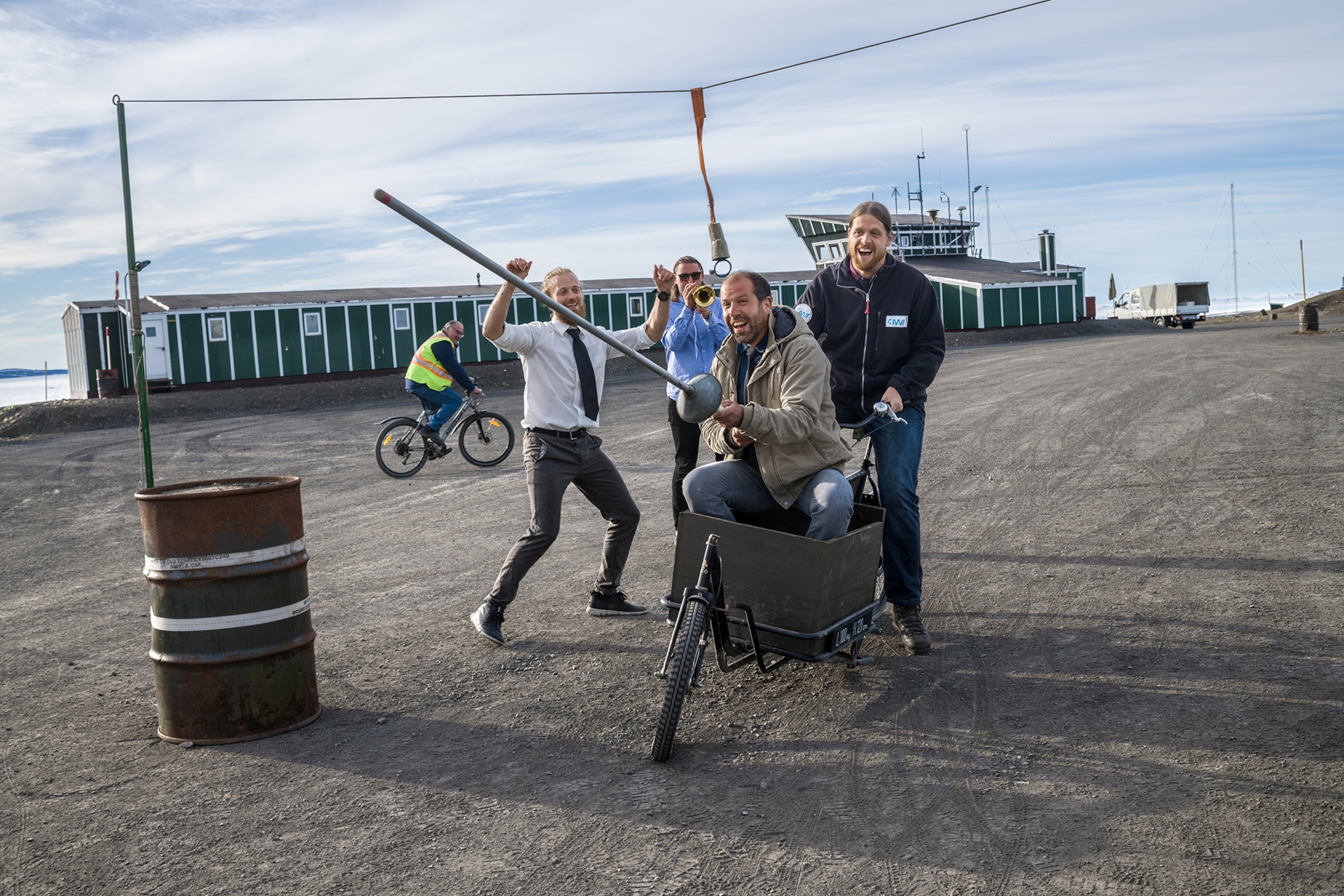 researchers and soldiers playing a jousting game