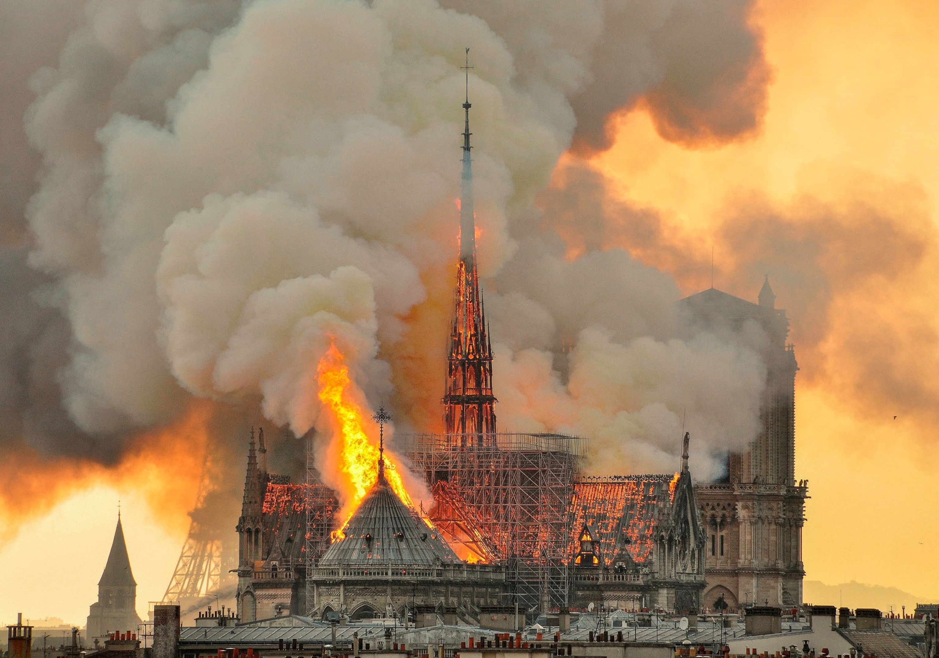 Picture of flames and smoke rising from the blaze at Notre Dame cathedral.