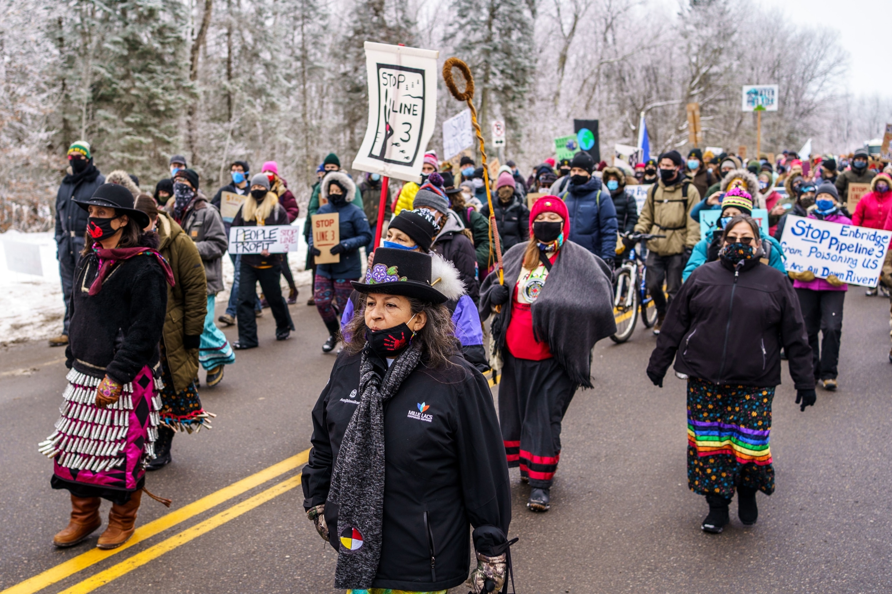 environmental activist marching to the construction site for the Line 3 oil pipeline