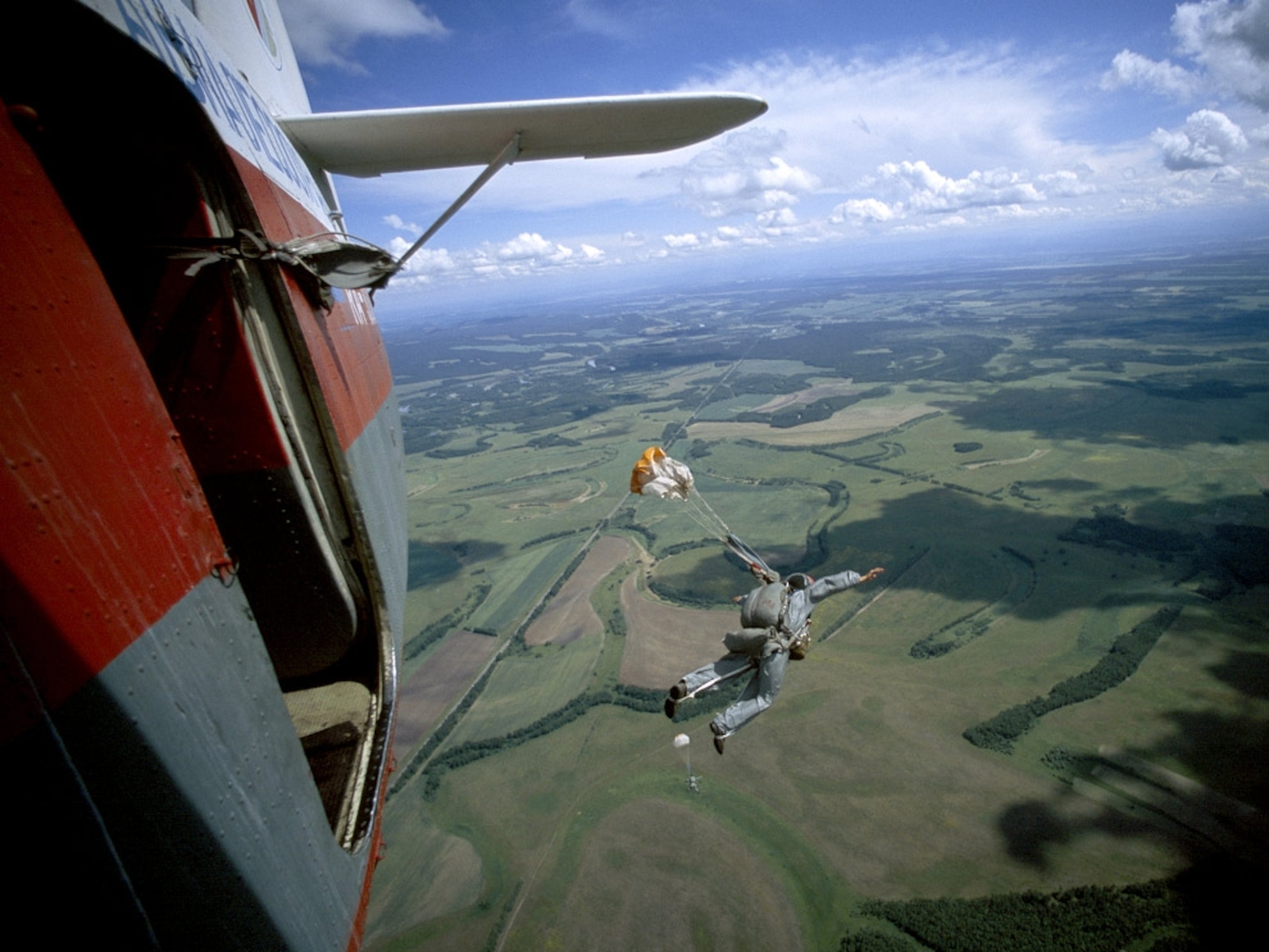 Firefighter jumping out of plane