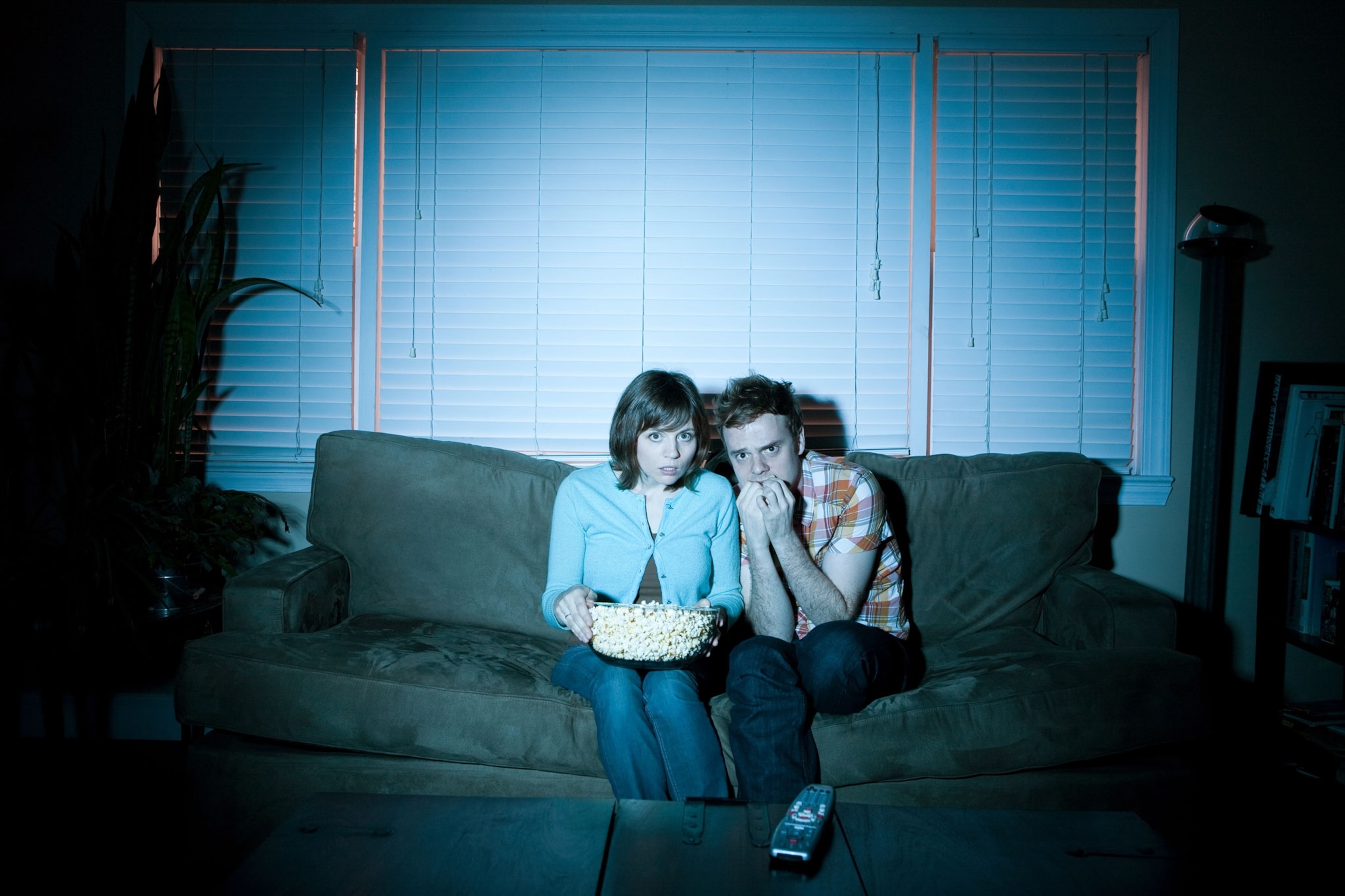 couple watches a scary movie