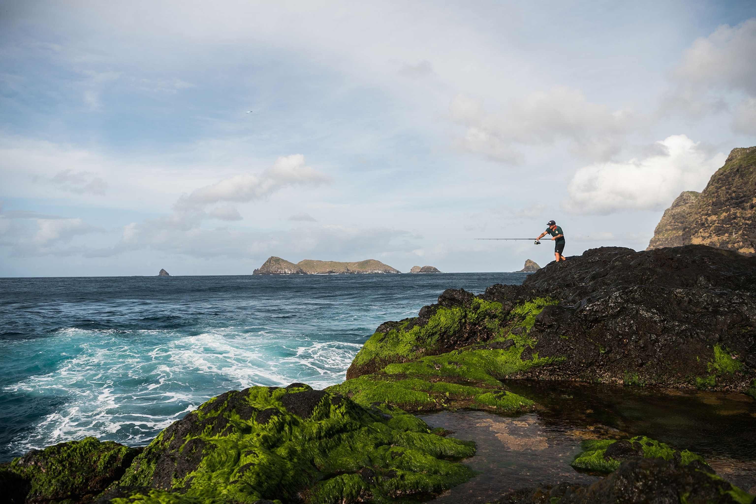 a fisherman at Curio Point at Lorde Howe Island, New South Wales