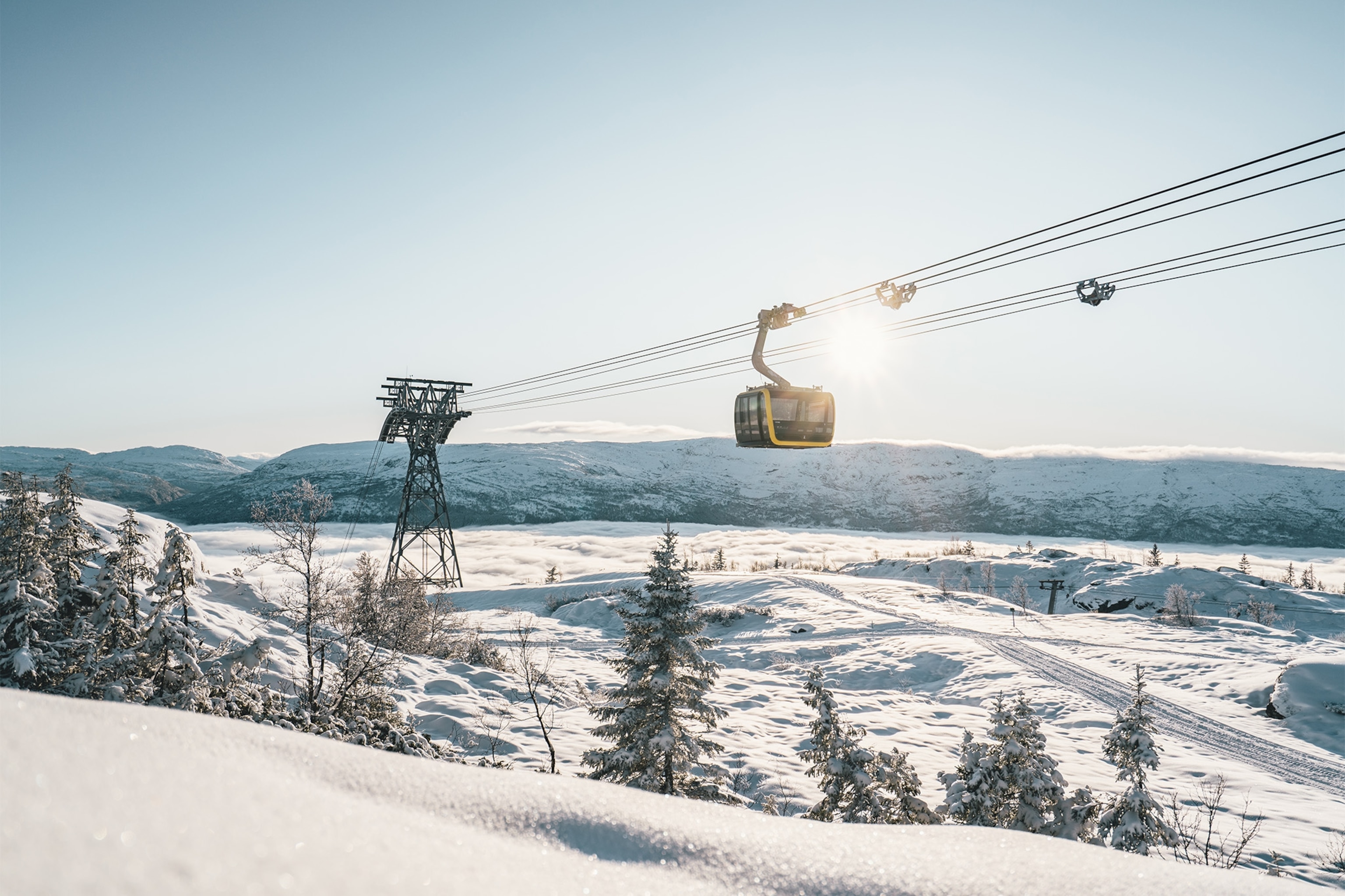gondolas above the slopes in norway