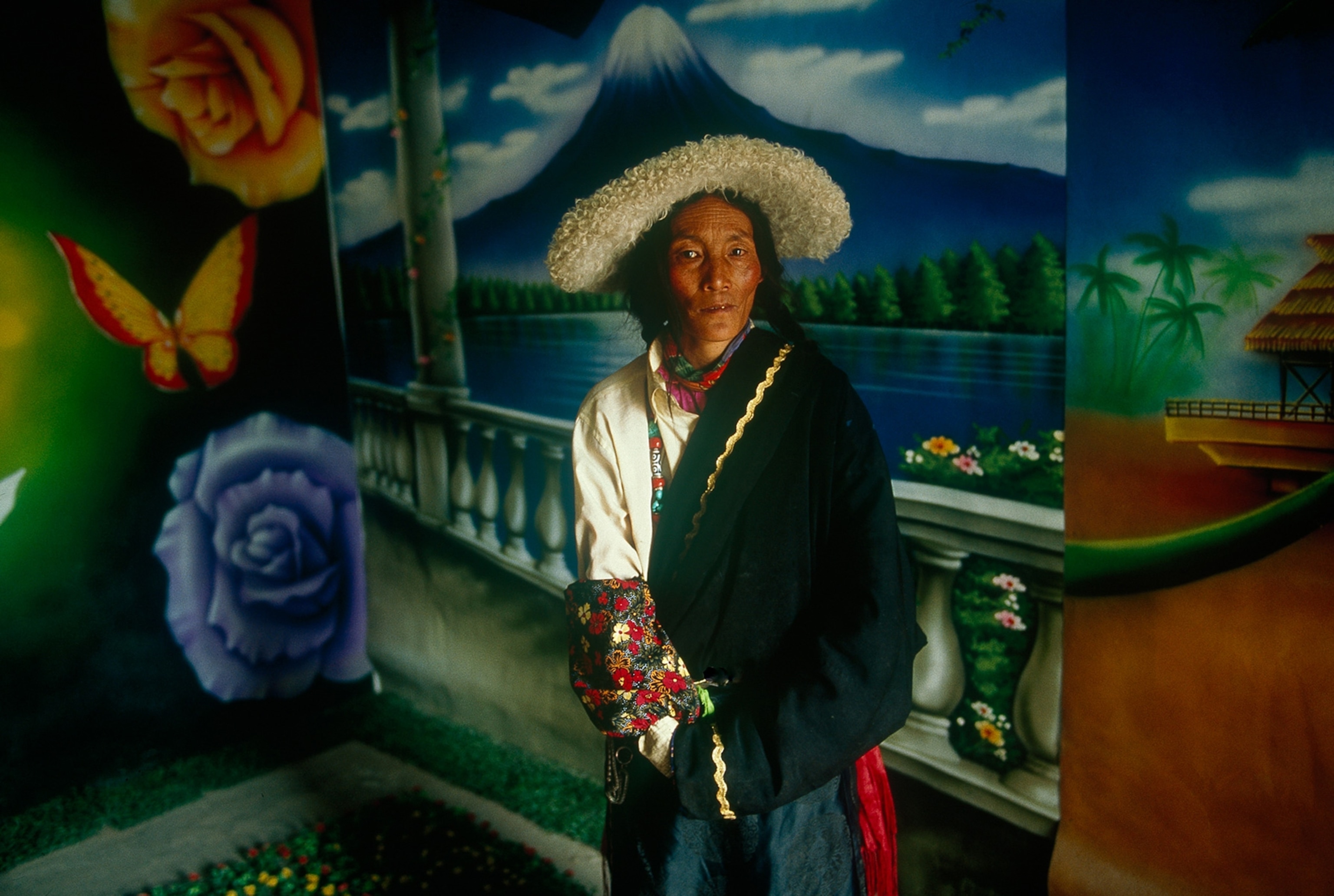 a Tibetan woman posing for a portrait in Jyekundo, China