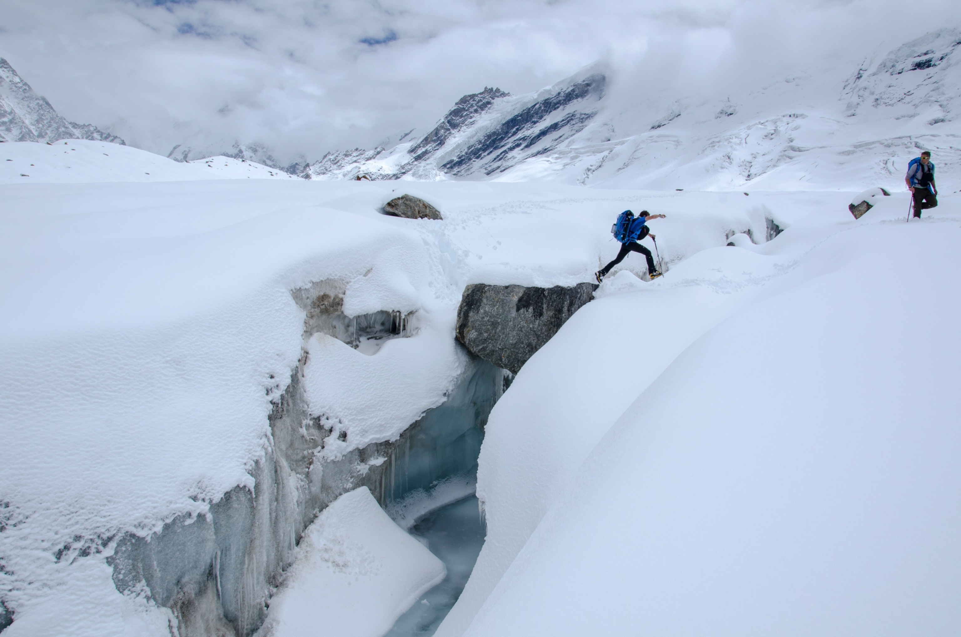 Dave Morton and Jake Norton navigating a crevasse in the Indian HImalaya