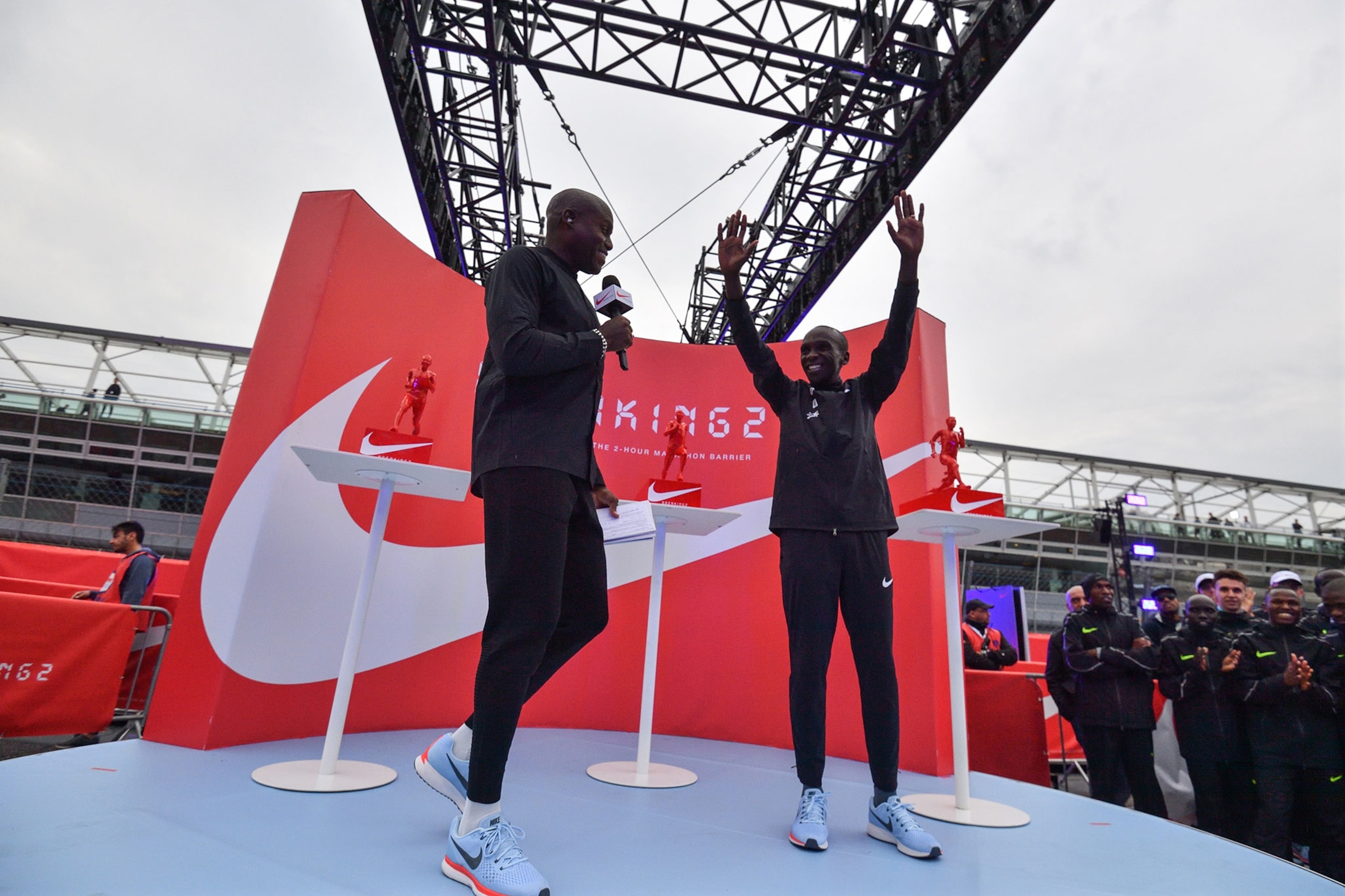Eliud Kipchoge standing on the podium