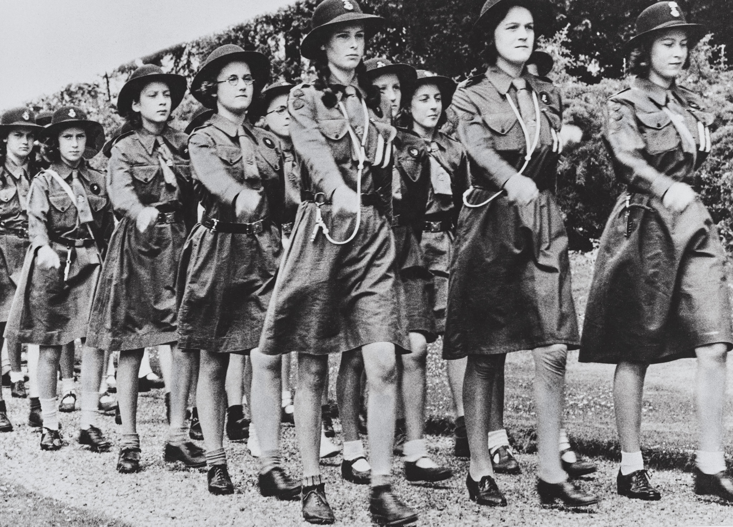 The princess (farthest right) was a member of a unique Girl Guide troop, the Buckingham Palace Guide Company.