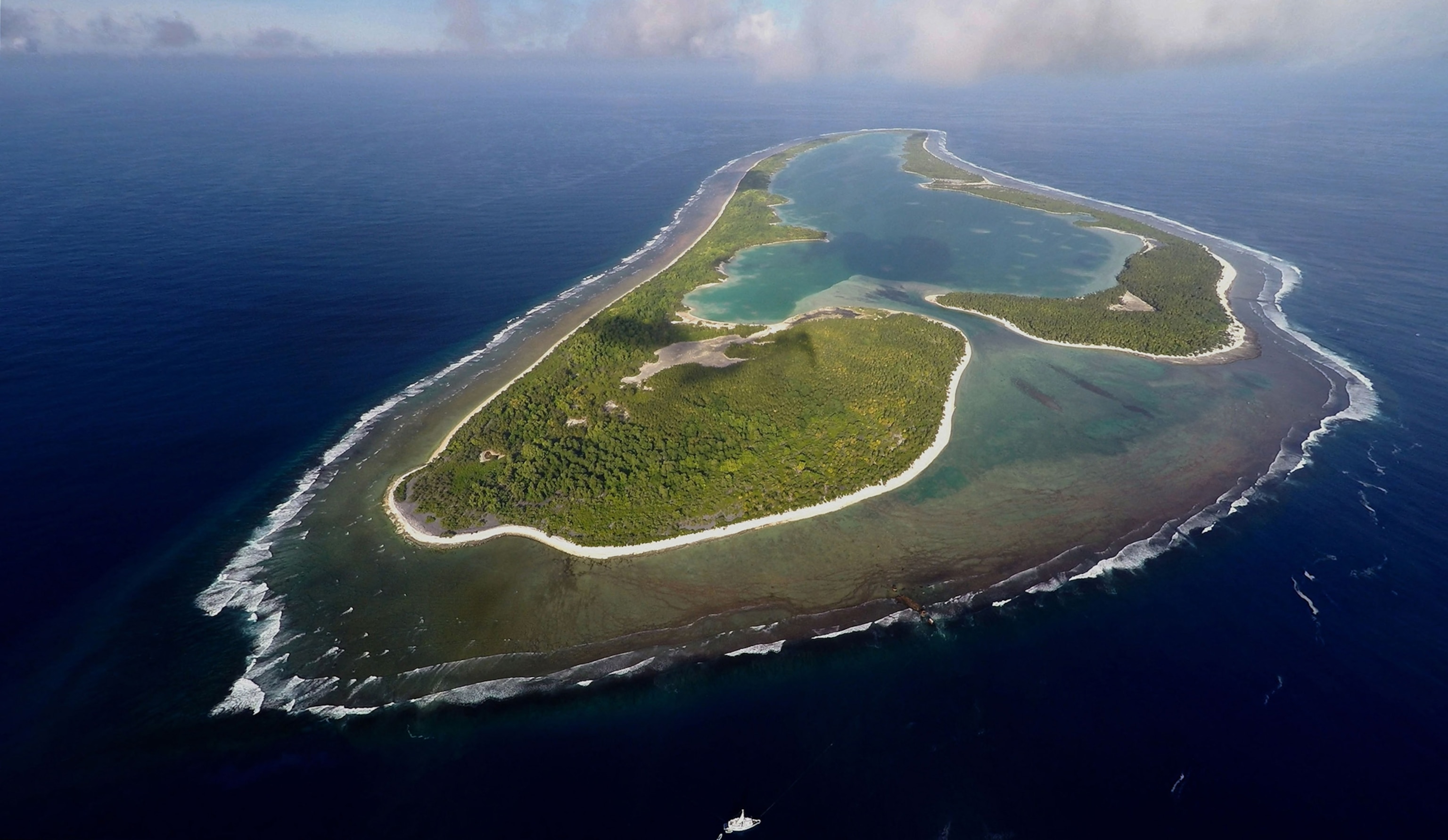 aerial view of a small island in the sea.