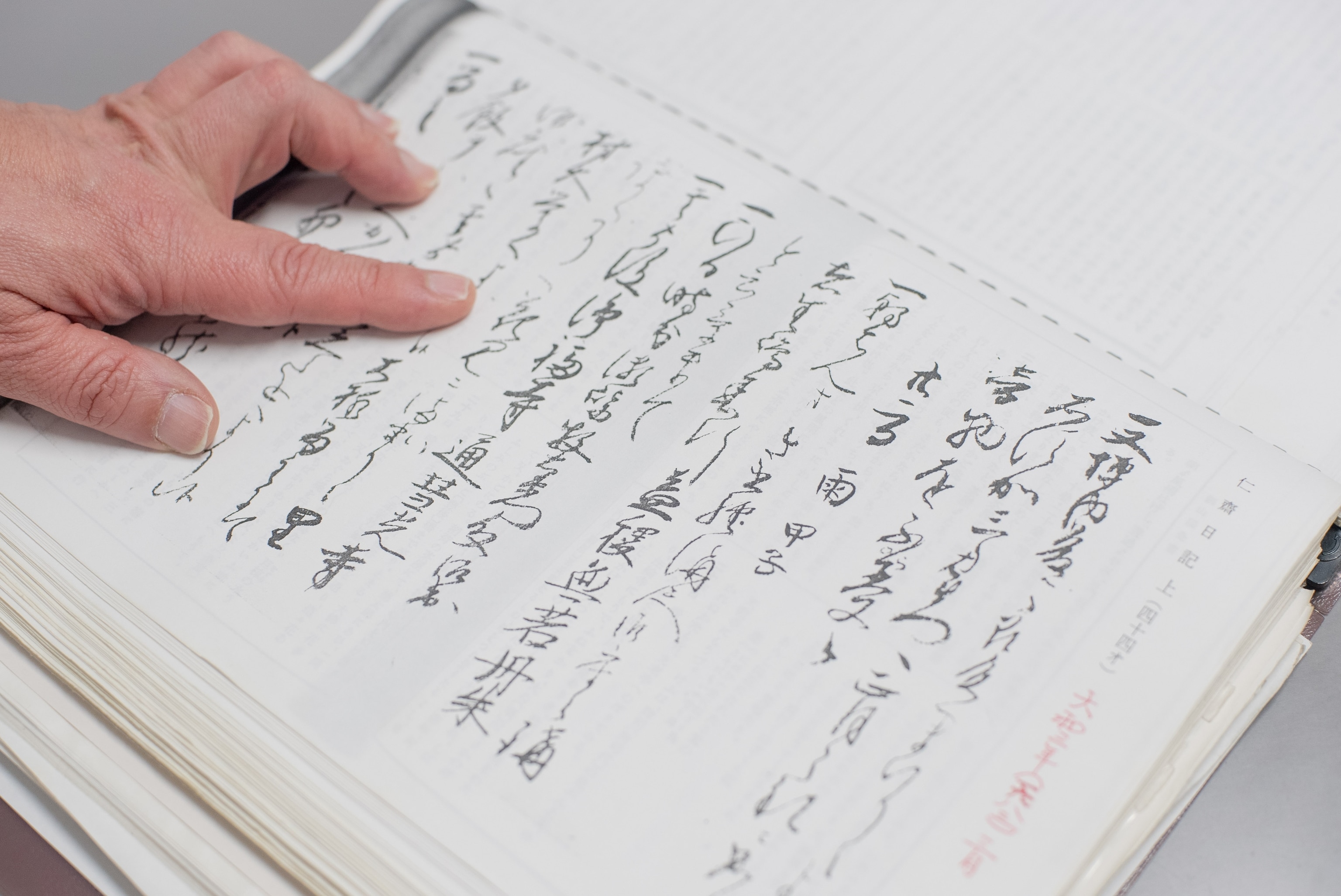 An old historical text with Japanese script from which researchers have gathered phenological data.