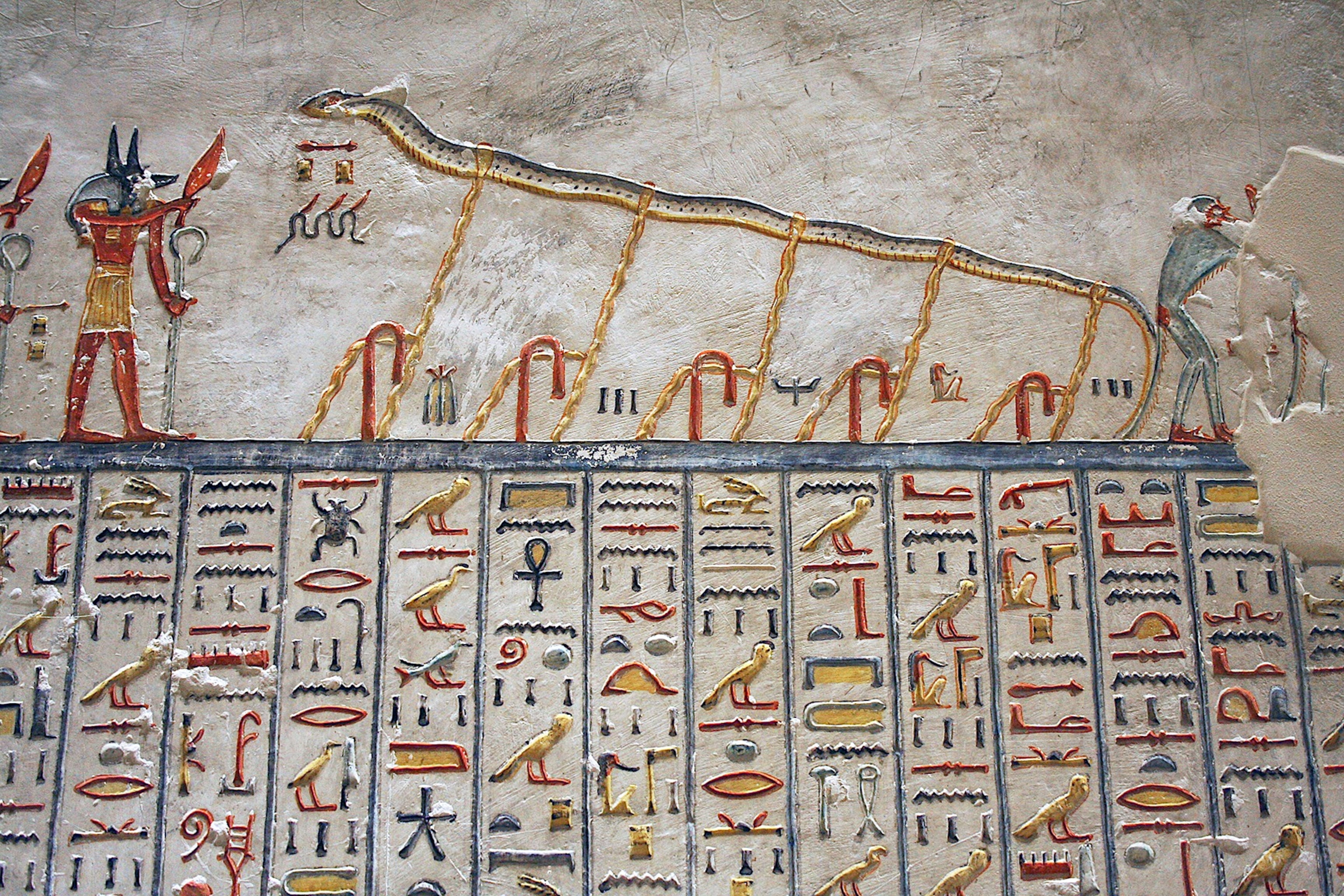 Apep, represented here as a serpent or dragon, is painted above a series of hieroglyphs.
