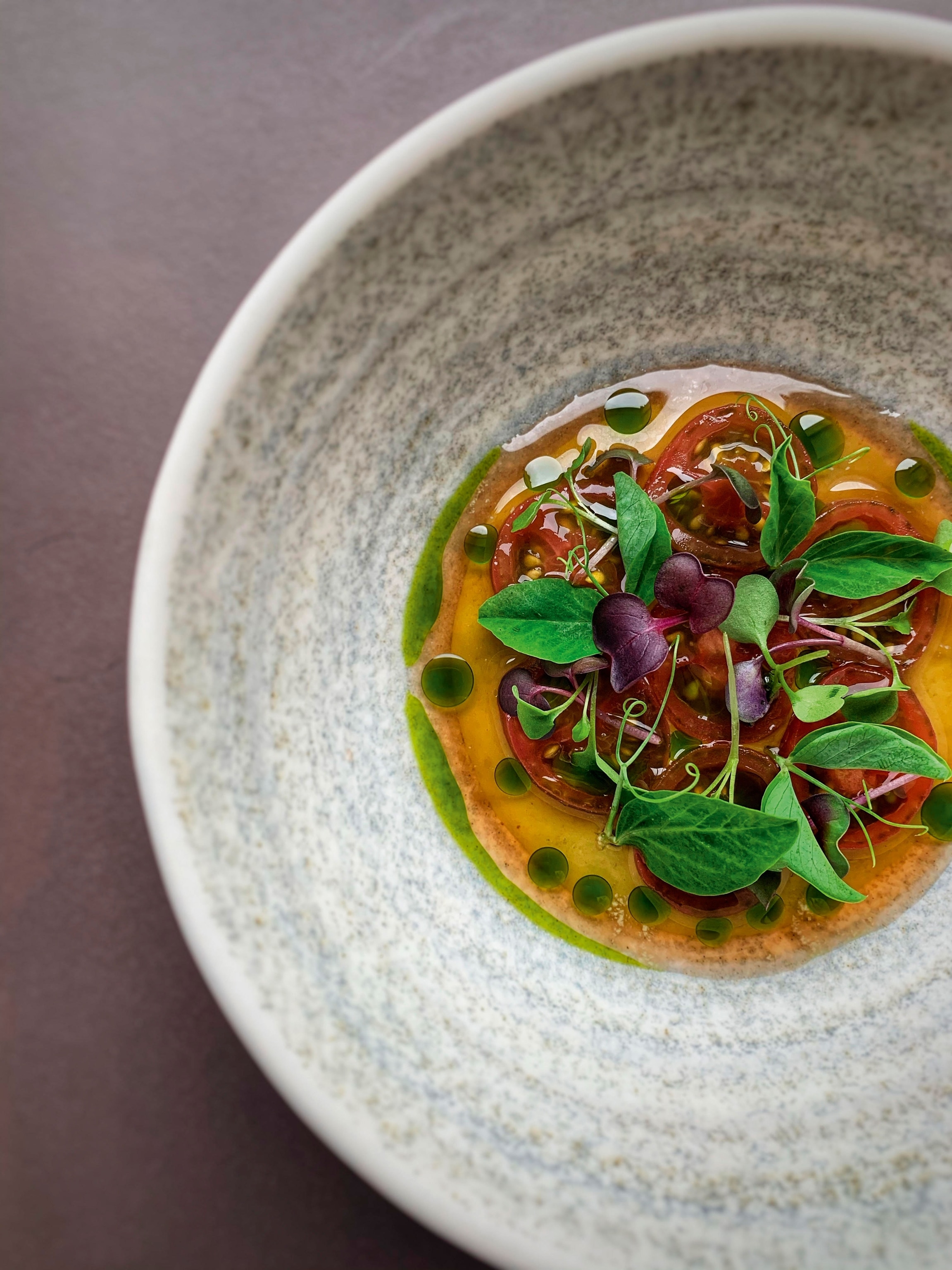 overhead shot of tomatoe and rooibos dish.