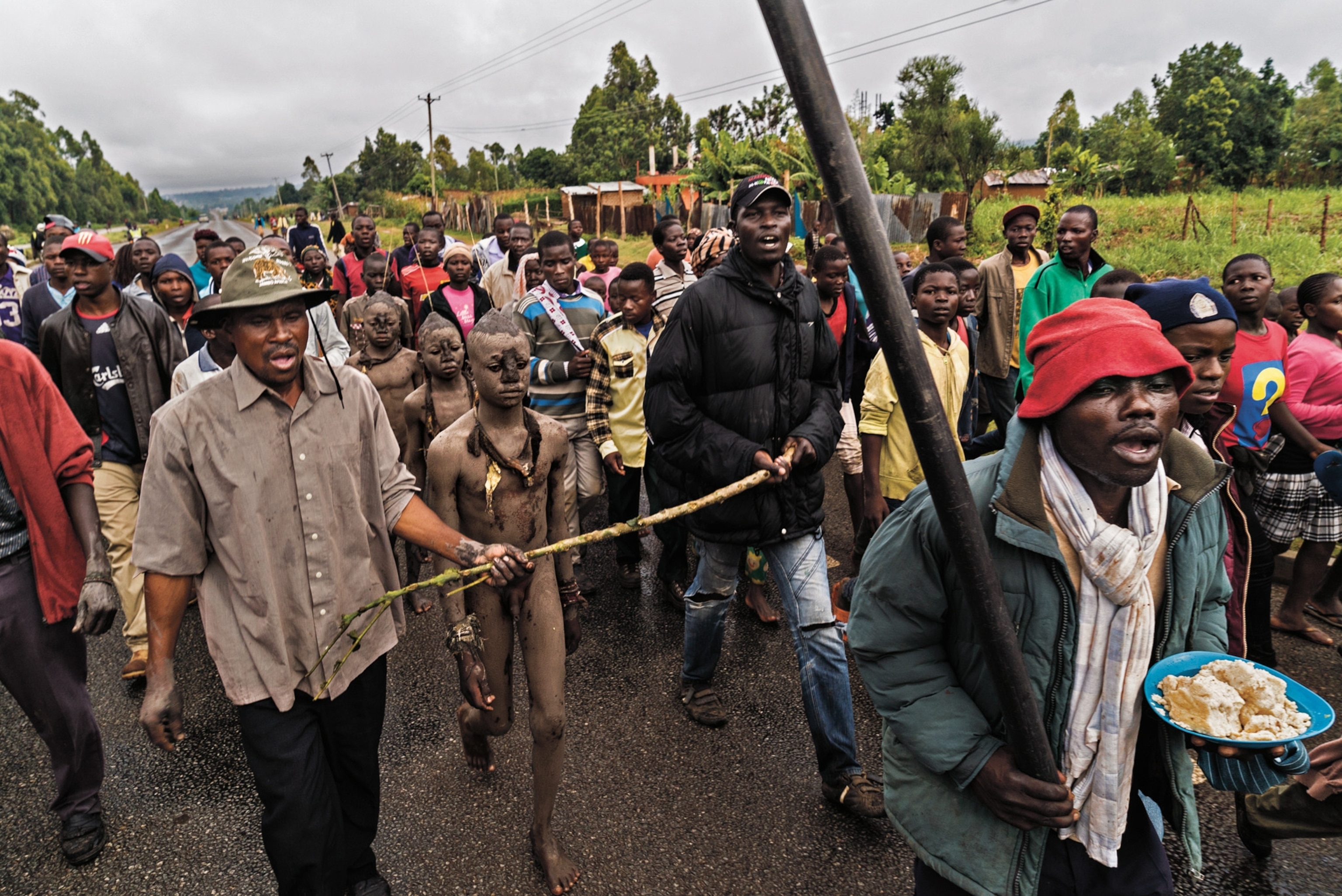 naked boys in a crowd procession