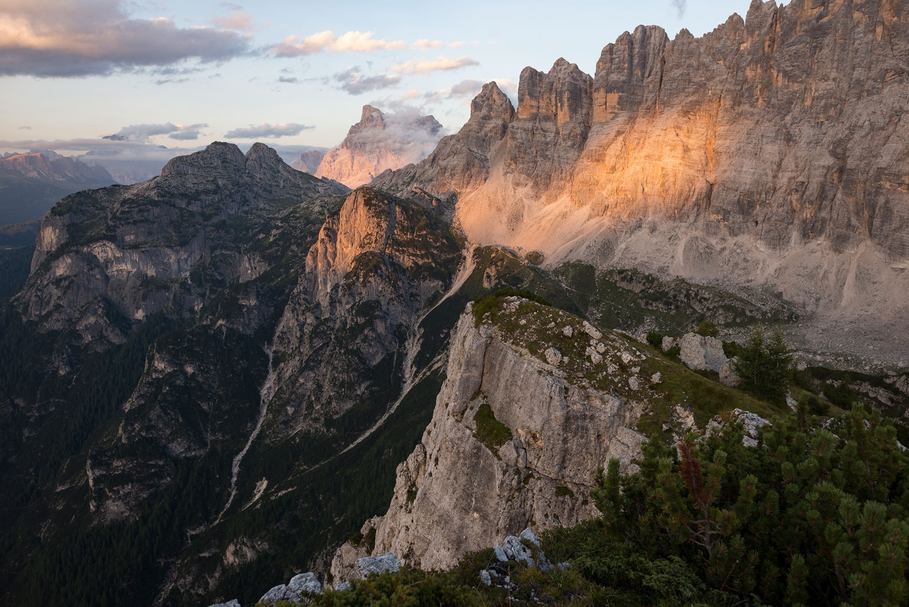 Golden light hits Monte Civetta in the Dolomites range.