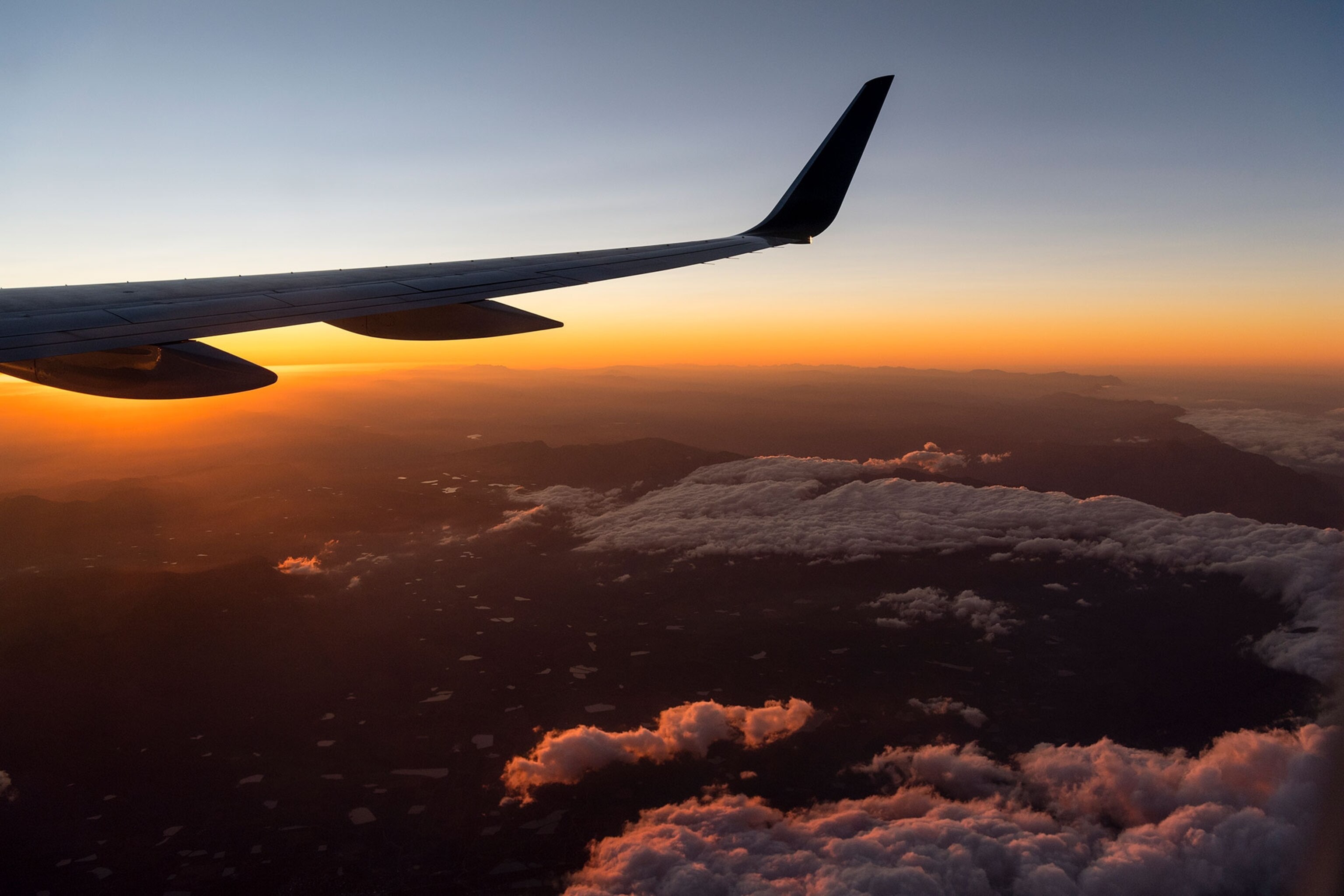 a plane wing over Cape Town, South Africa