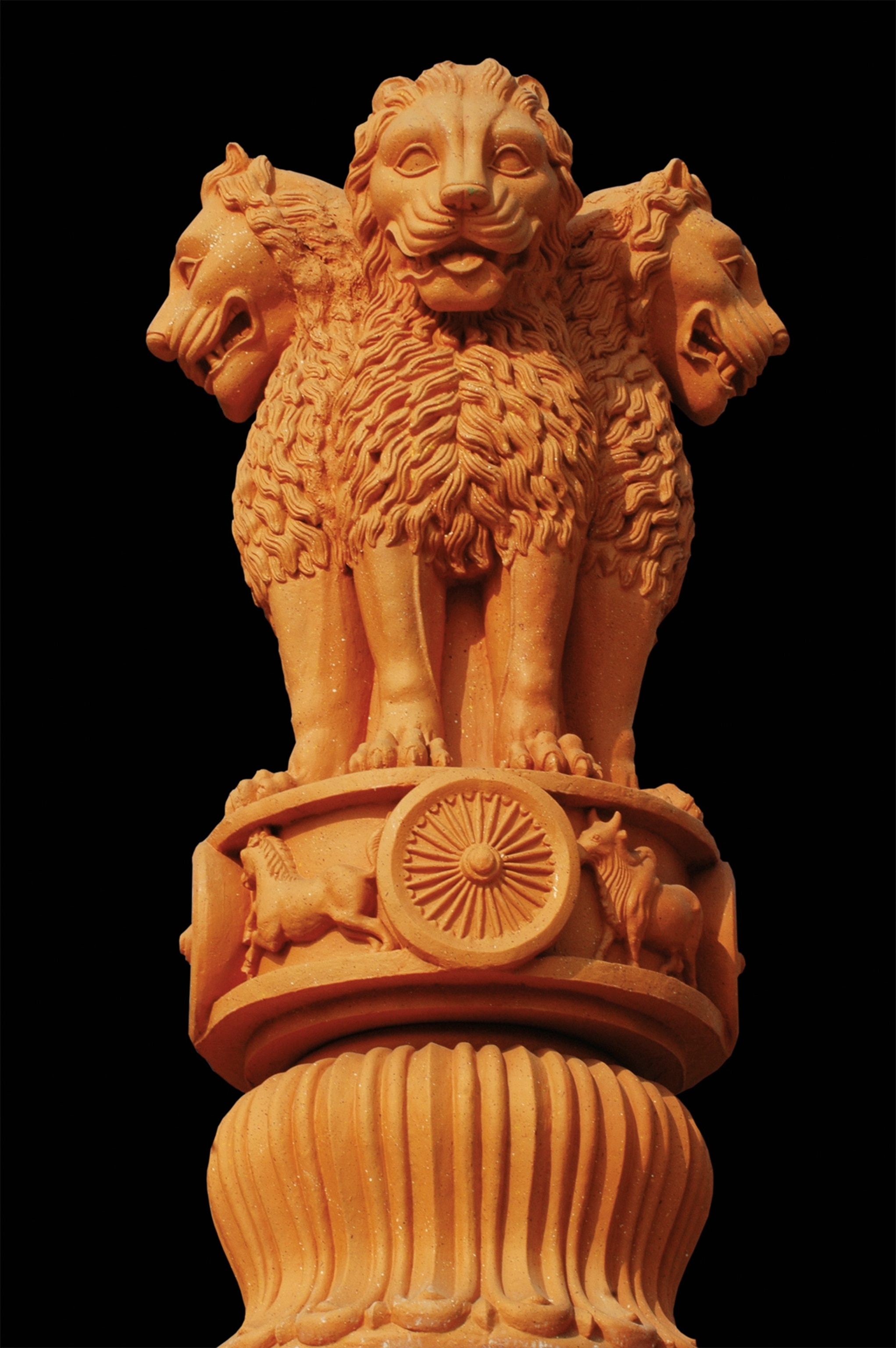 India’s national emblem shows three lions back-to-back on a pillar.