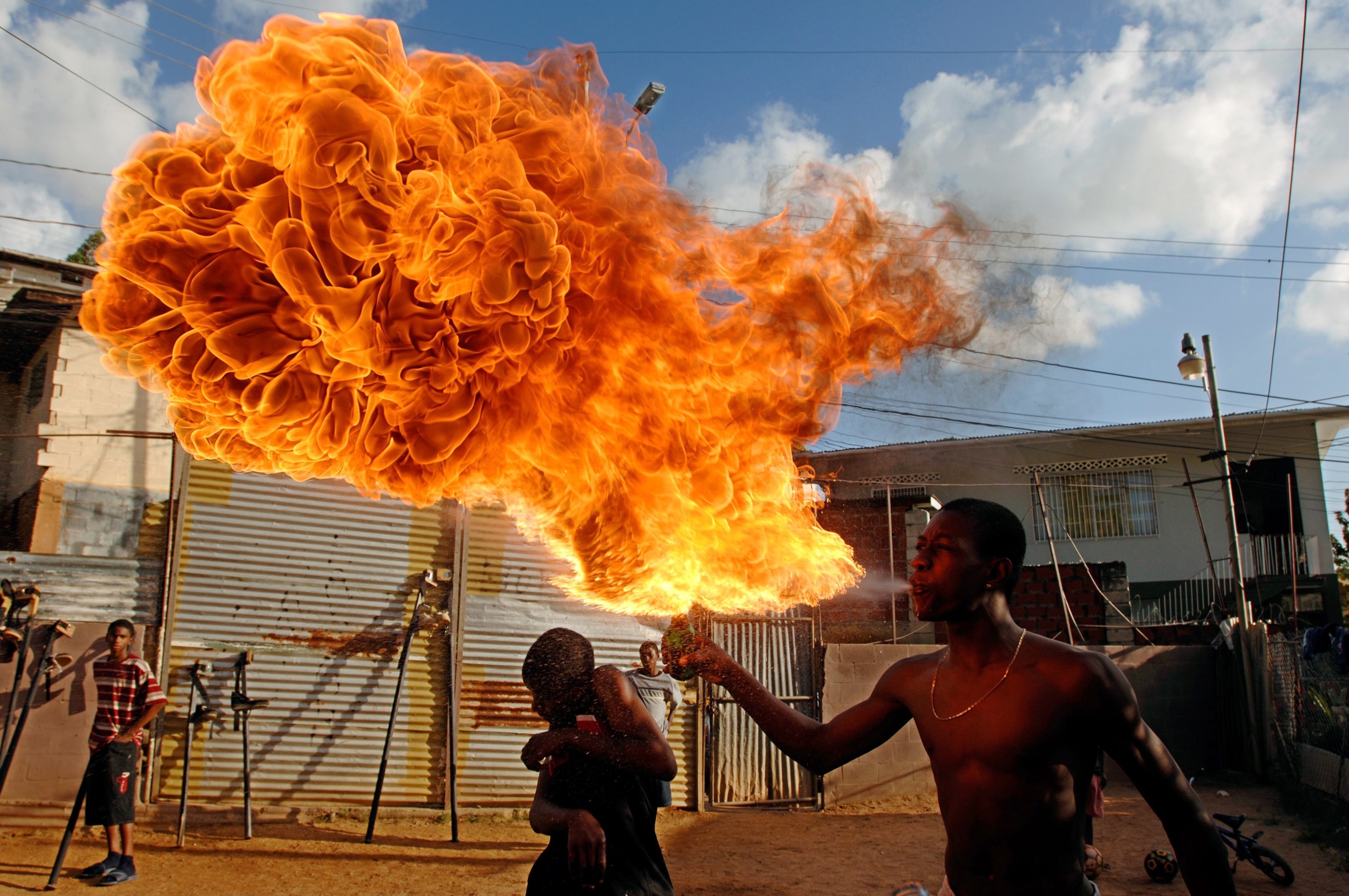 fire blowing while practicing for carnival in Trinidad