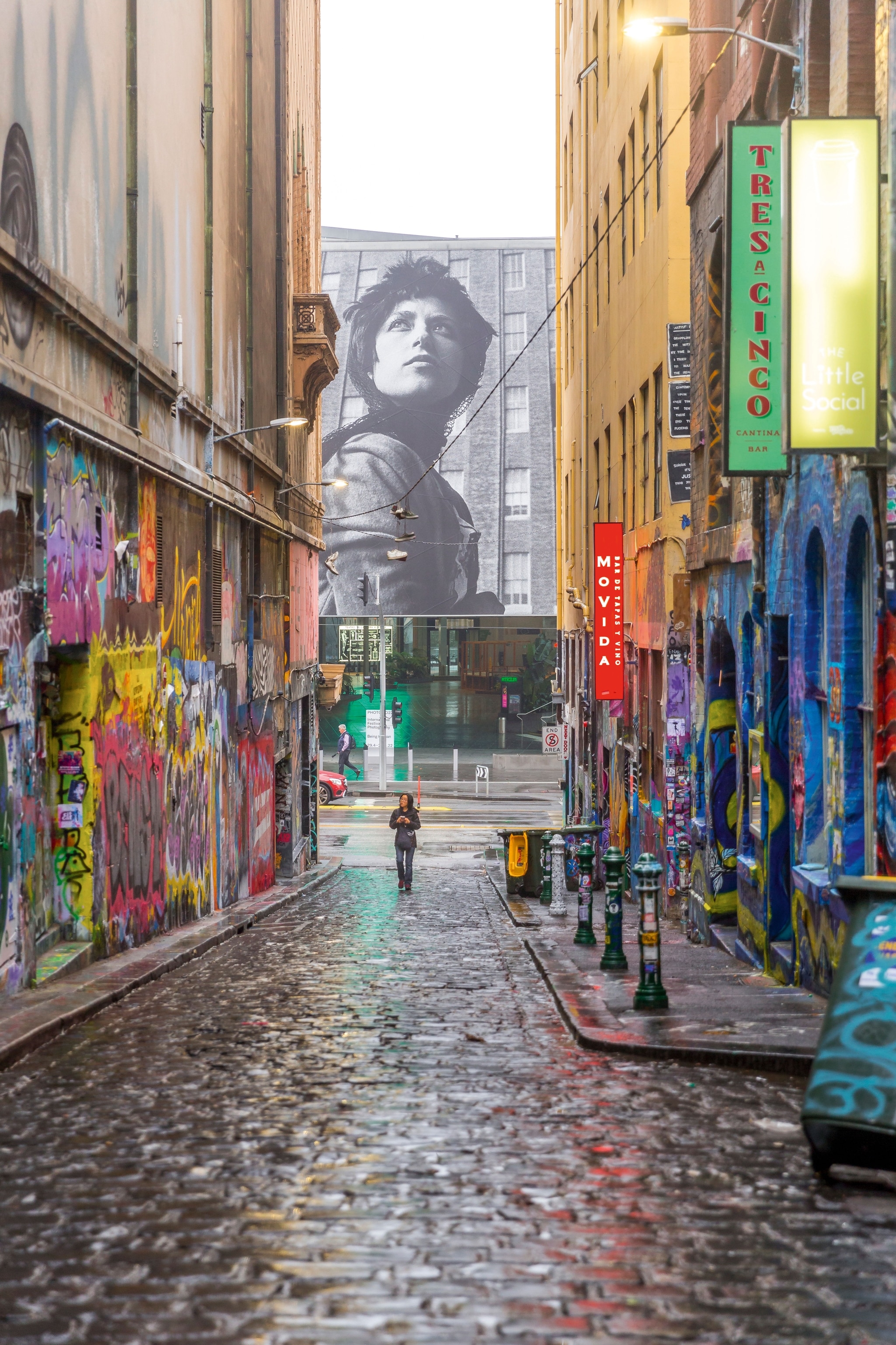 street covered in cart on the walls and in the background