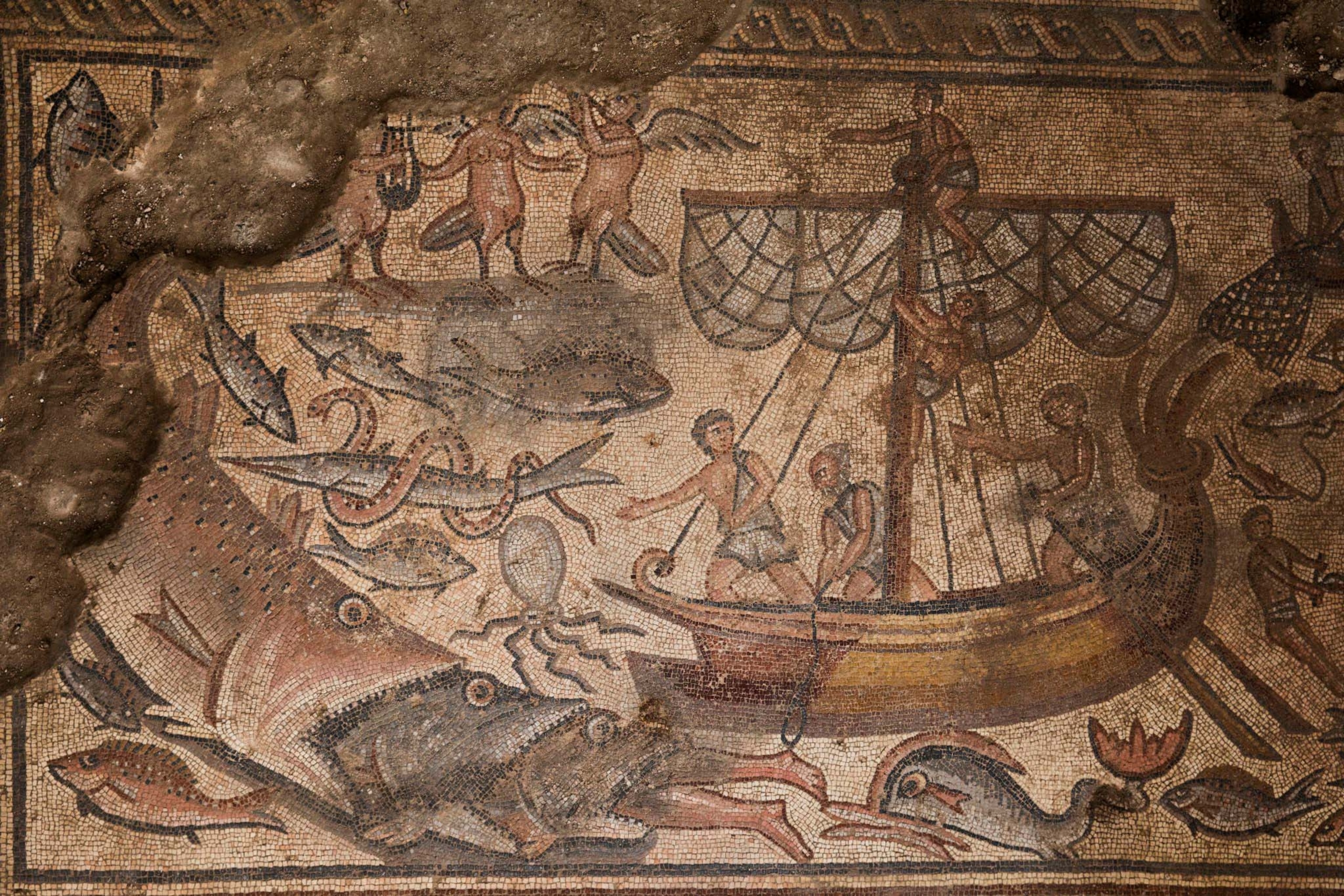 depiction of fisherman on a boat at sea