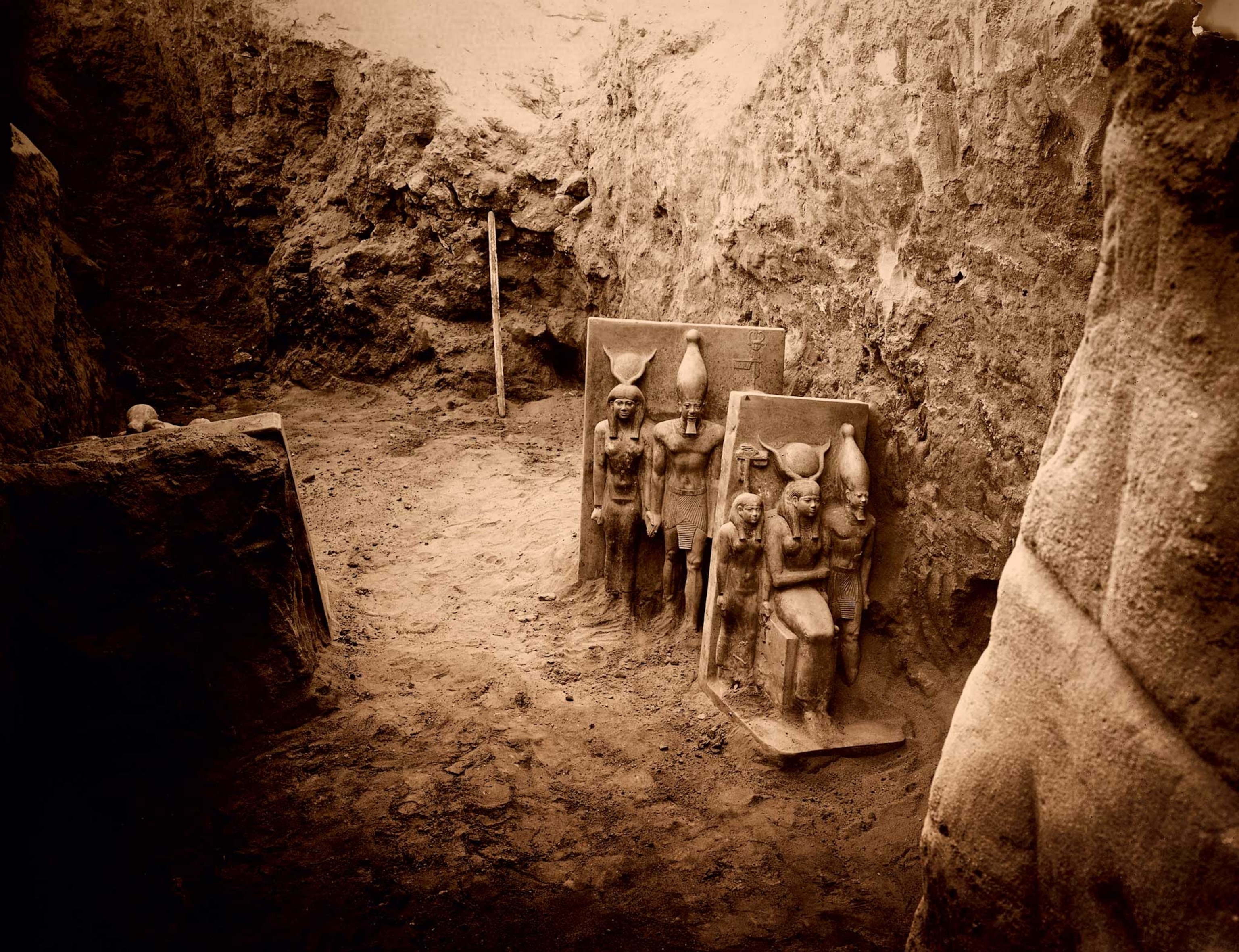Taken in 1908, a photo reveals two of Menkaure’s triad sculptures soon after their discovery at Menkaure’s Valley Temple in Giza.