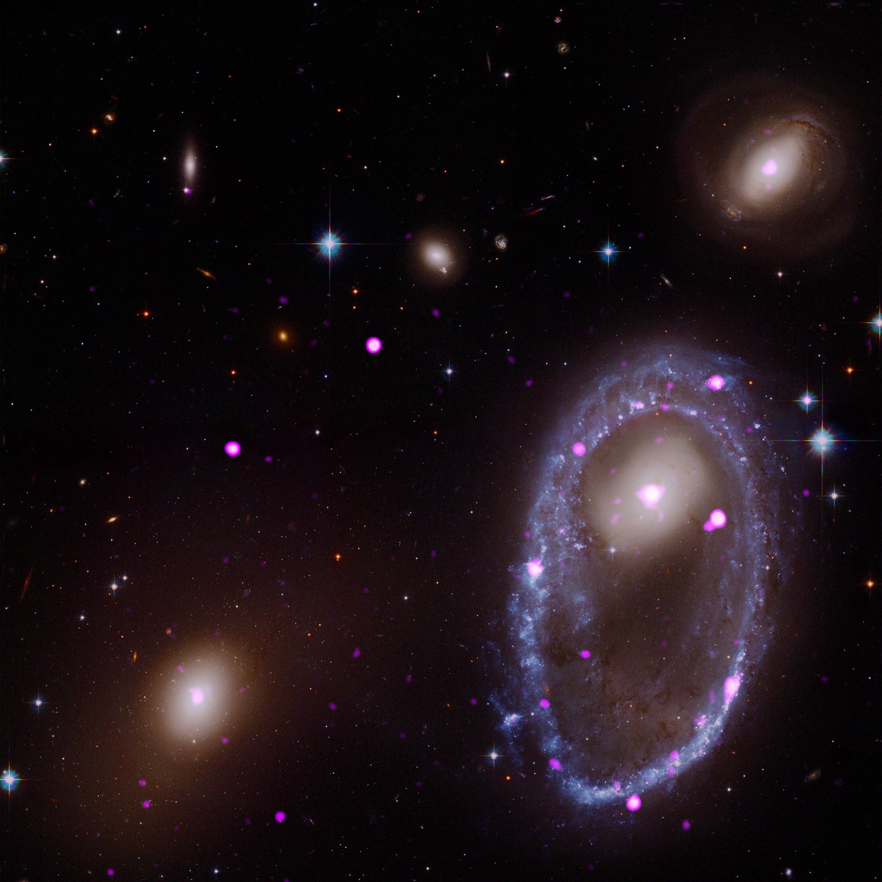 cosmic collision forges galactic one ring–in x-rays.