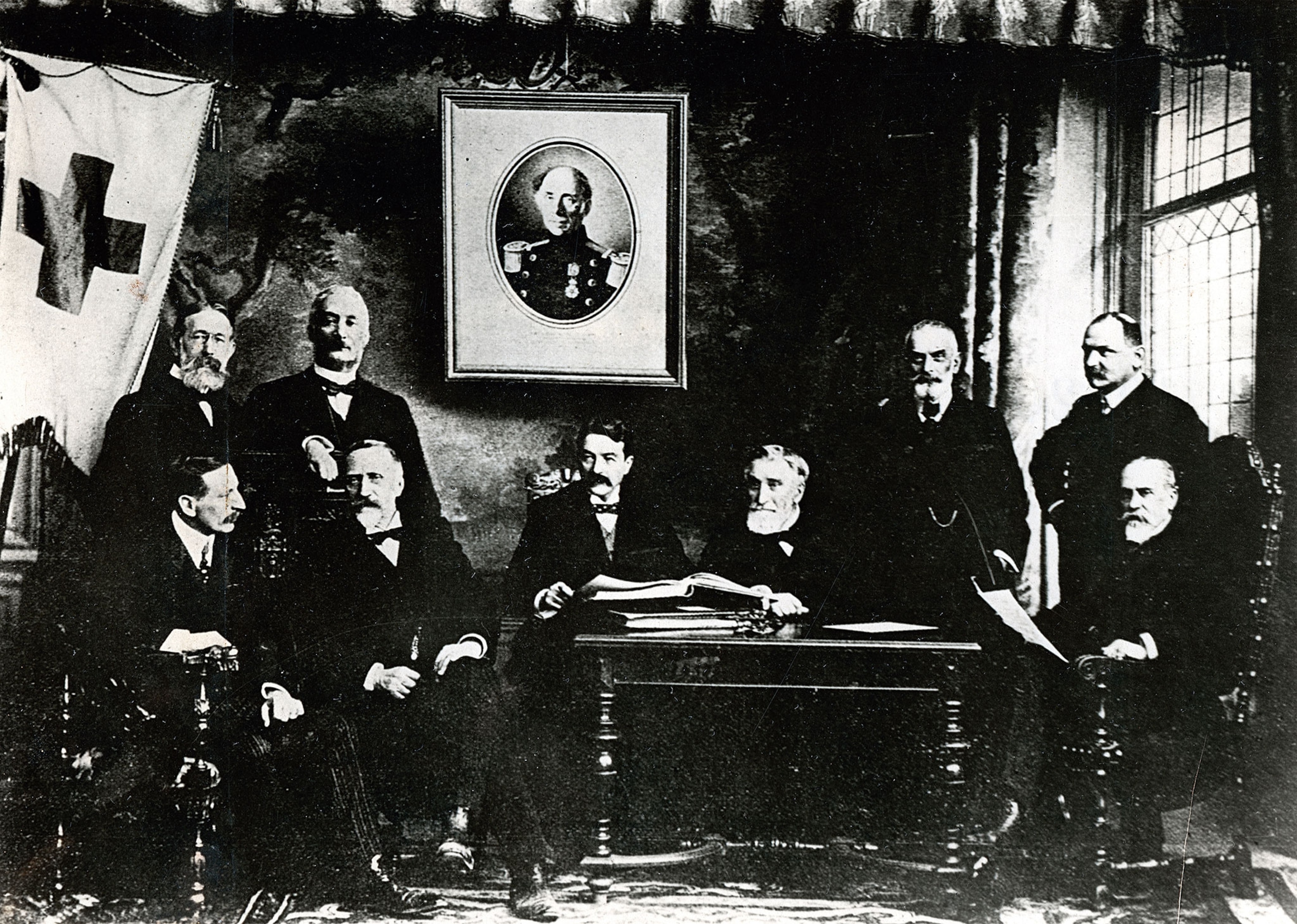 A black and white photo of delegates attending a Red Cross conference