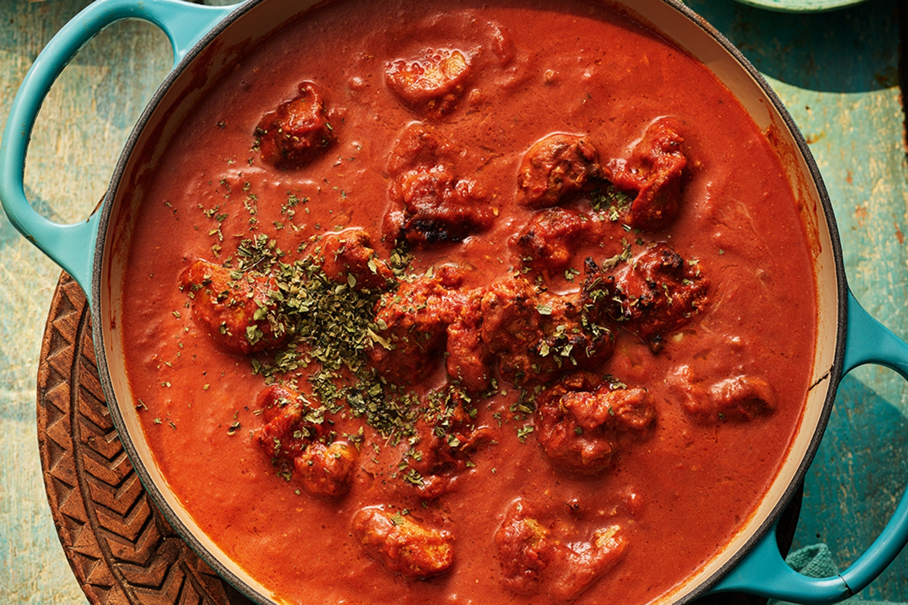 Butter chicken curry served in a hotpot dish