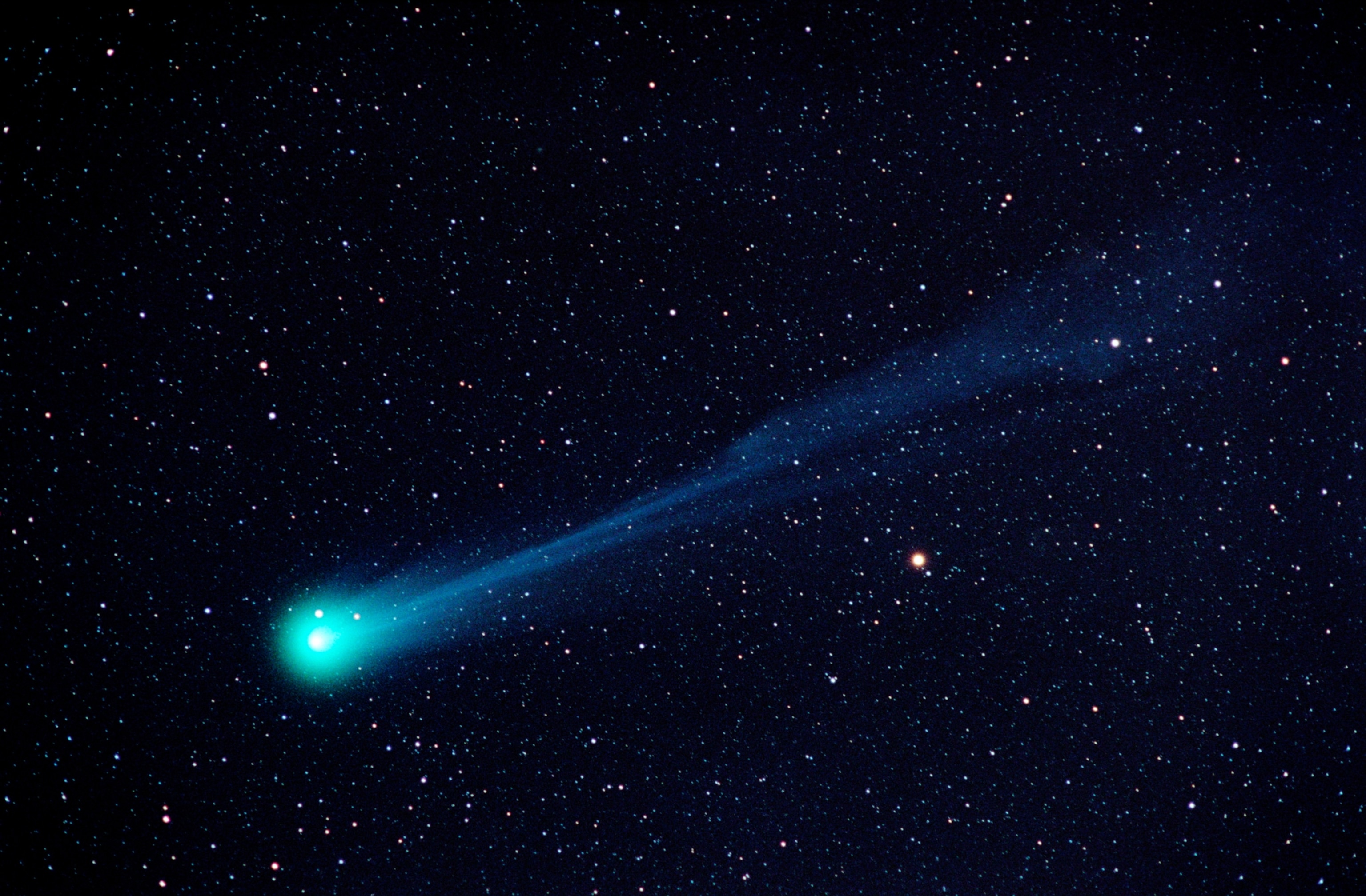 Comet Hyakutake in the night sky.