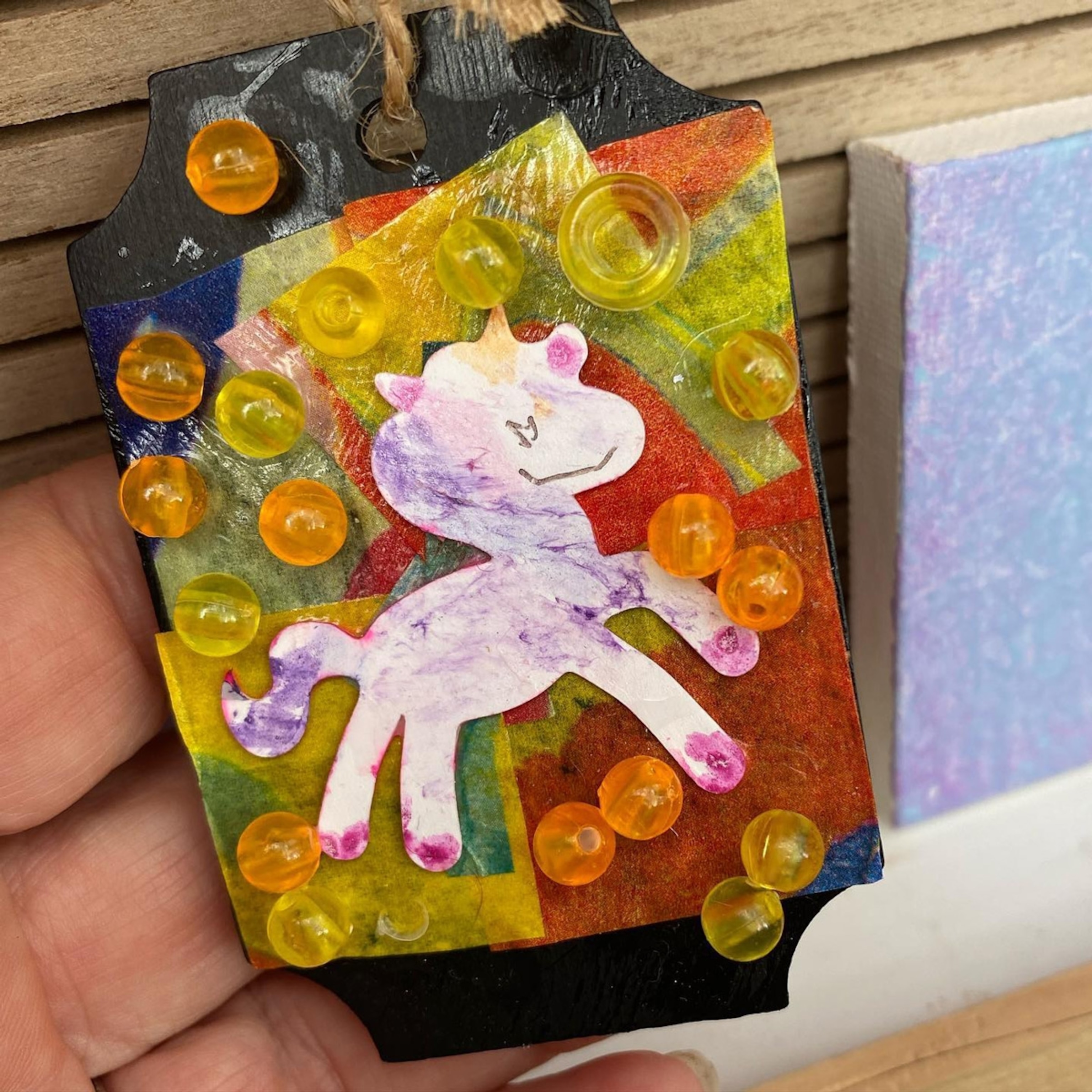 Unicorn art with beads created by Samaya (6-7) for FLAG SRQ, Sarasota.