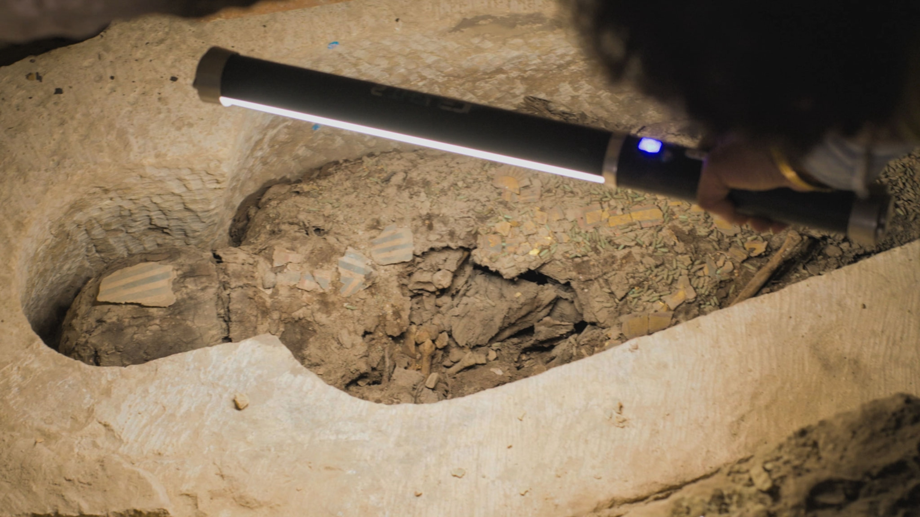 a mummy being excavated in Egypt