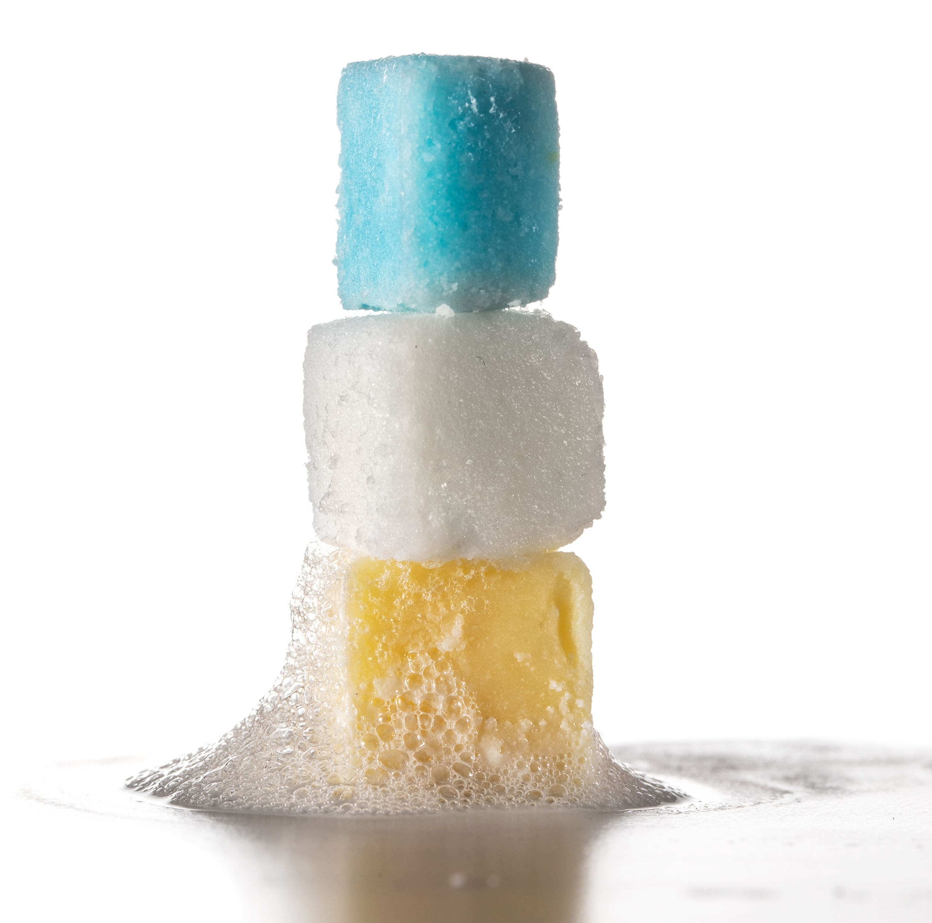 stocked yellow, white and blue soapy cubes.