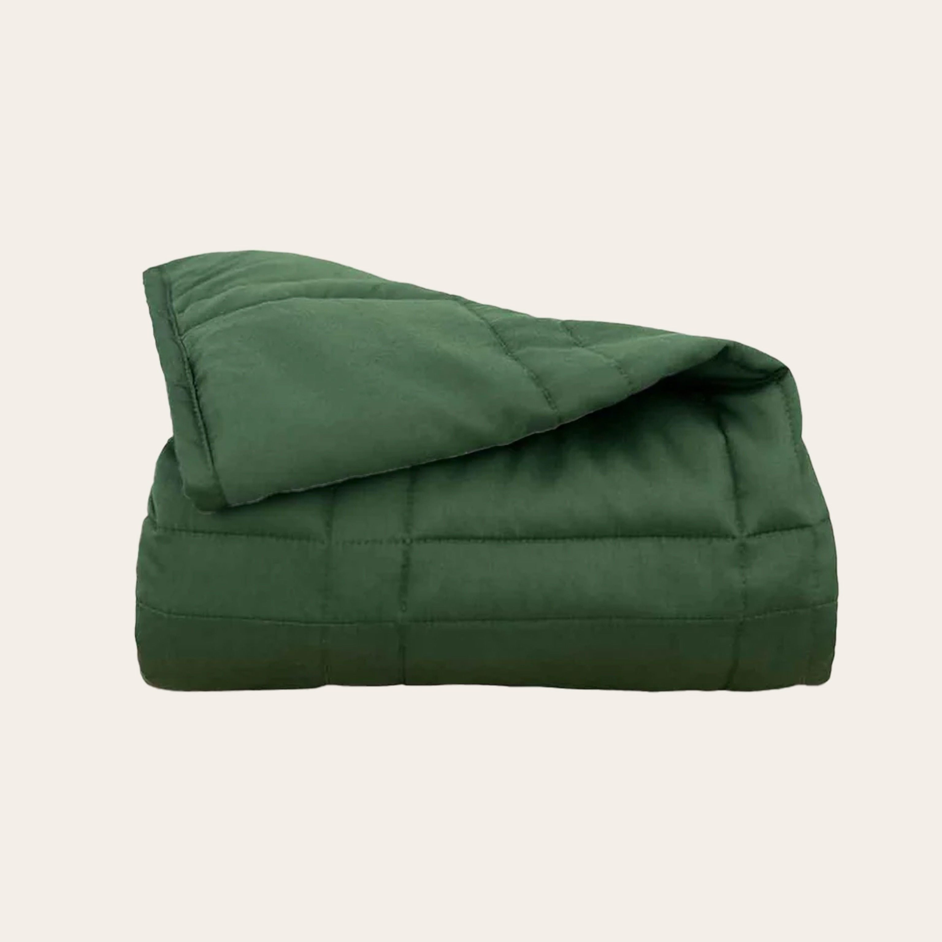 A green Baloo weighted blanket