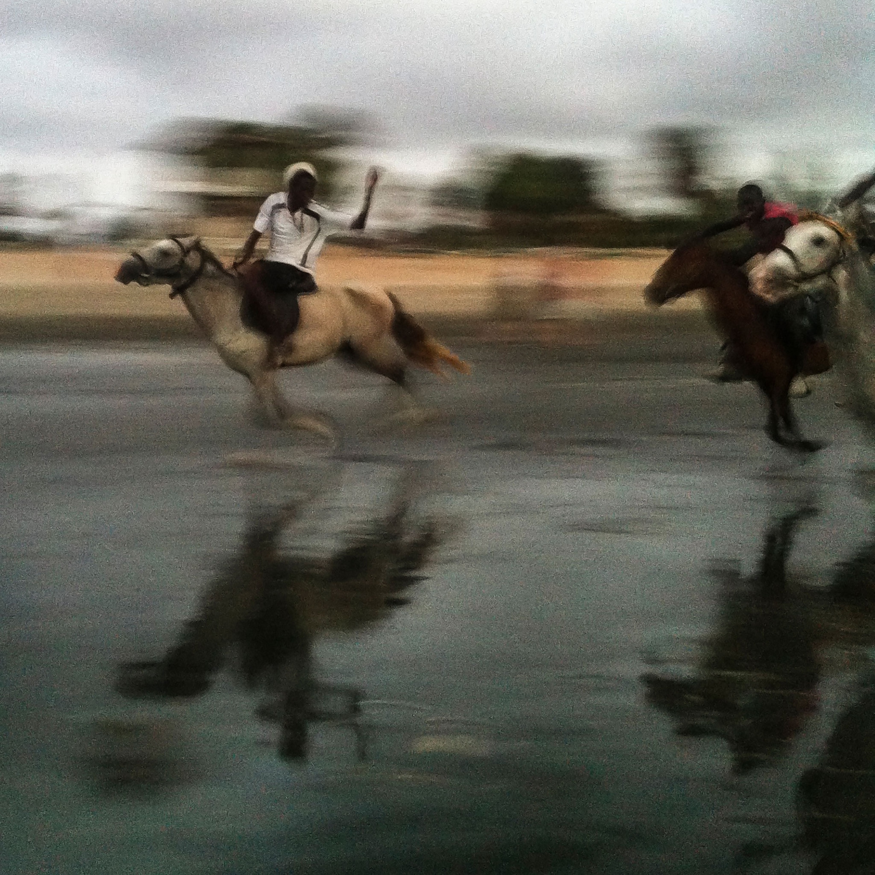 a horse race on Senegambia Beach, Gambia